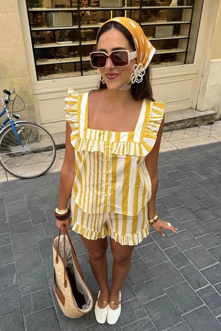 butter yellow striped matching set paired with white ballet flat shoes for a cute and chic summer outdoor women