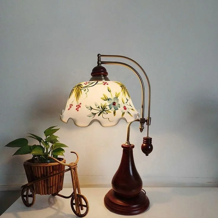 unique vintage styled lamp with wooden base, glass lamp shade with a floral design