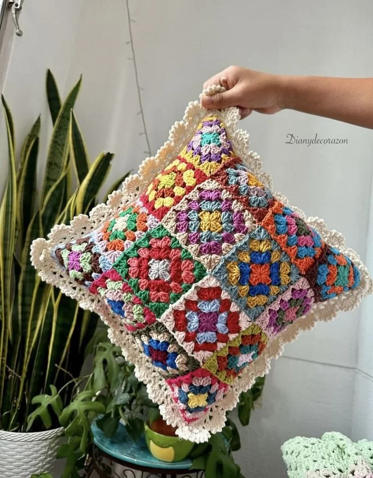 colorful granny square crochet throw pillow for cozy home decor