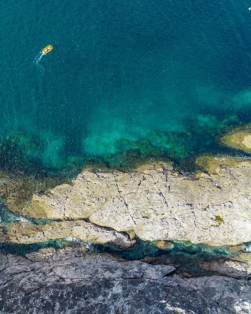 The natural eco-system of Opito Bay in the Coromandel combines a sensational sandy beach fringed by rock outcrops, reefs and islands. These structures are home to all manner of sea-life from molluscs to tiny fish, kelps to sea anemones. 

The mineral
