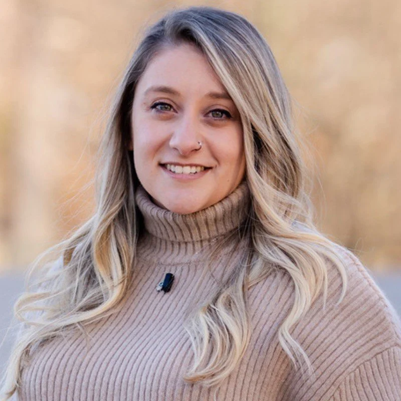 A headshot of Jackie C. from the client company Melillo Consulting.