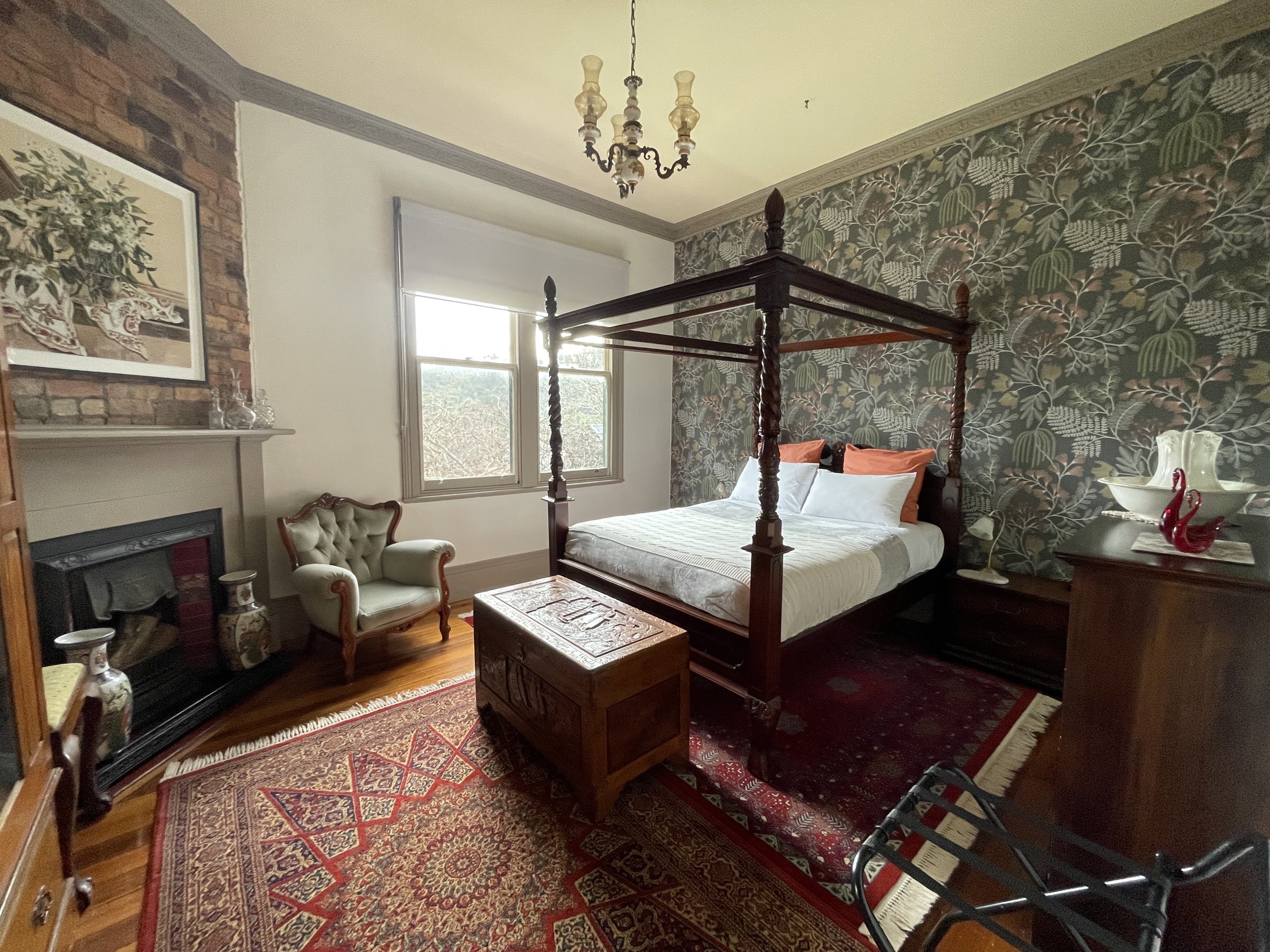 Bedroom with Queen bed, linen, panel heater