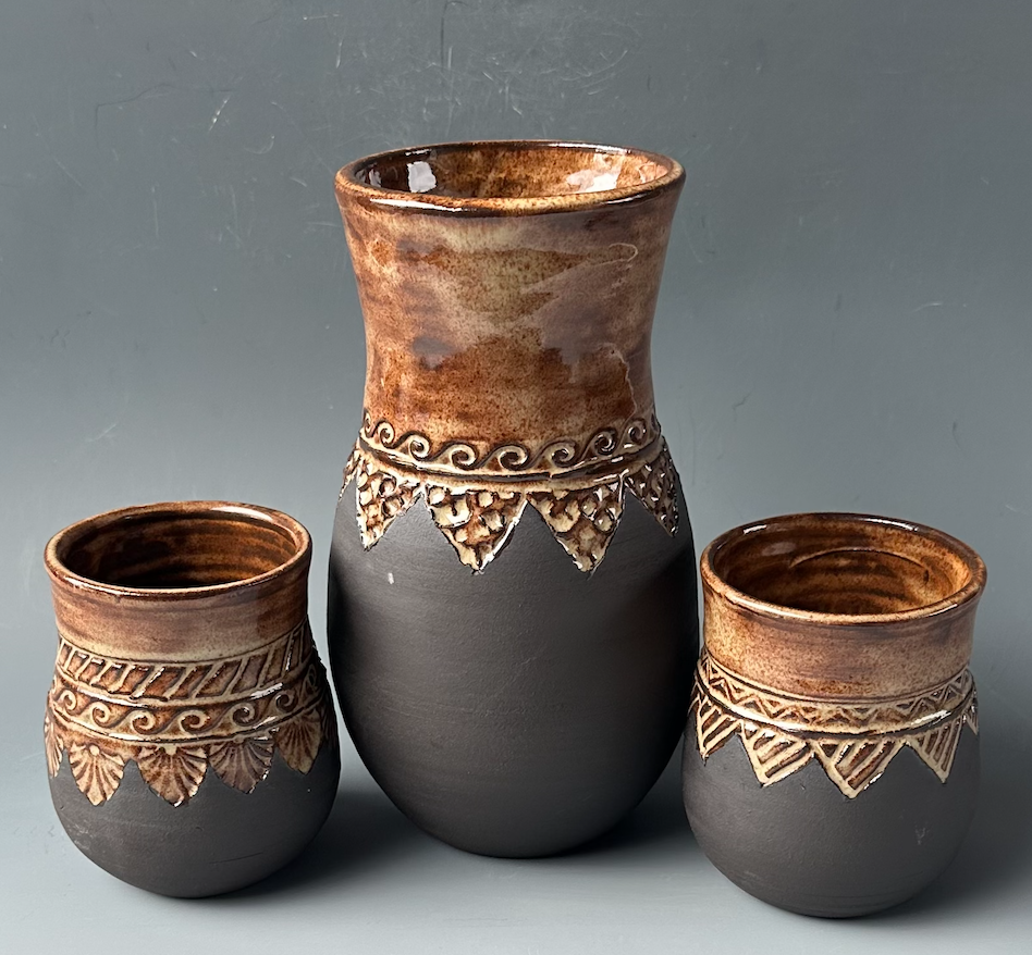 Jeanne C Wood, "Black Clay Set"