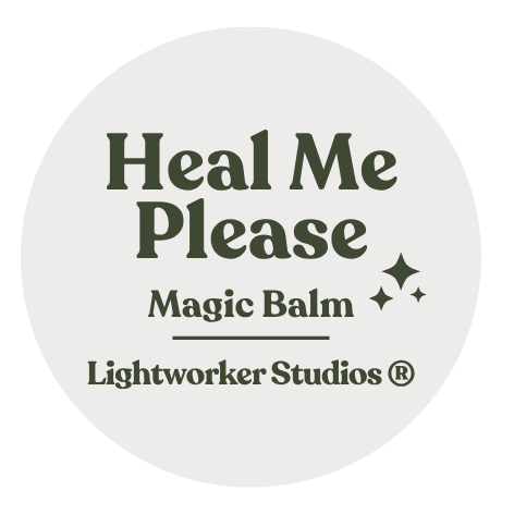 A white circular label with green text that reads "Heal Me Please" at the top, "Magic Balm" in the middle, and "Lightworker Studios" at the bottom, with small star-like sparkles.