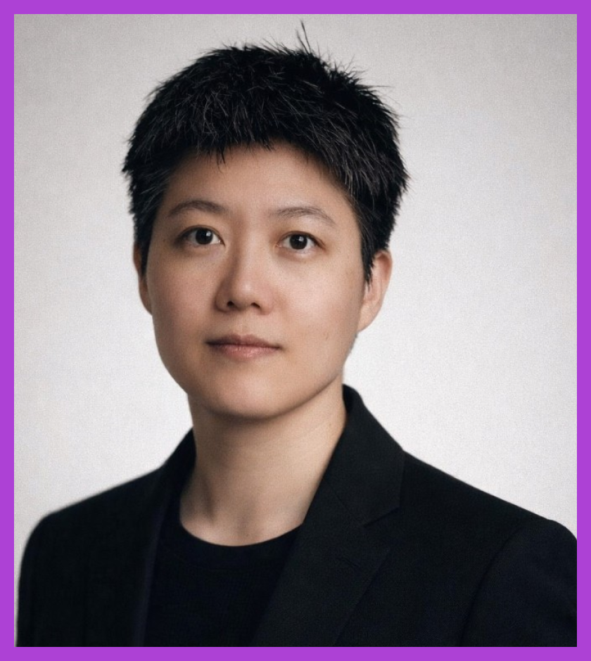 Headshot of Chris - a Chinese woman with short black hair and glasses, smiling gently at the camera against a light background.