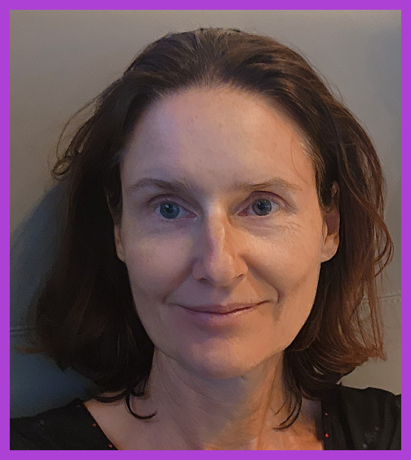 Headshot of Barbara - a Caucasian woman with dark brown hair, slightly smiling at the camera.