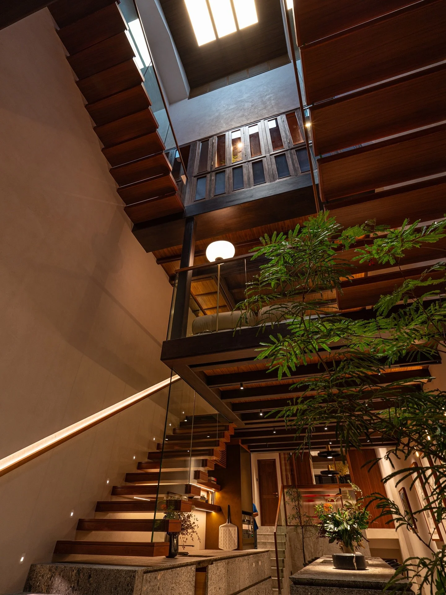 Situated within the historic Peranakan enclave of Emerald Hill, this project reinterprets the traditional Chinese Baroque shophouse as a contemporary residence that seamlessly integrates heritage conservation with modern family living. The site&rsquo