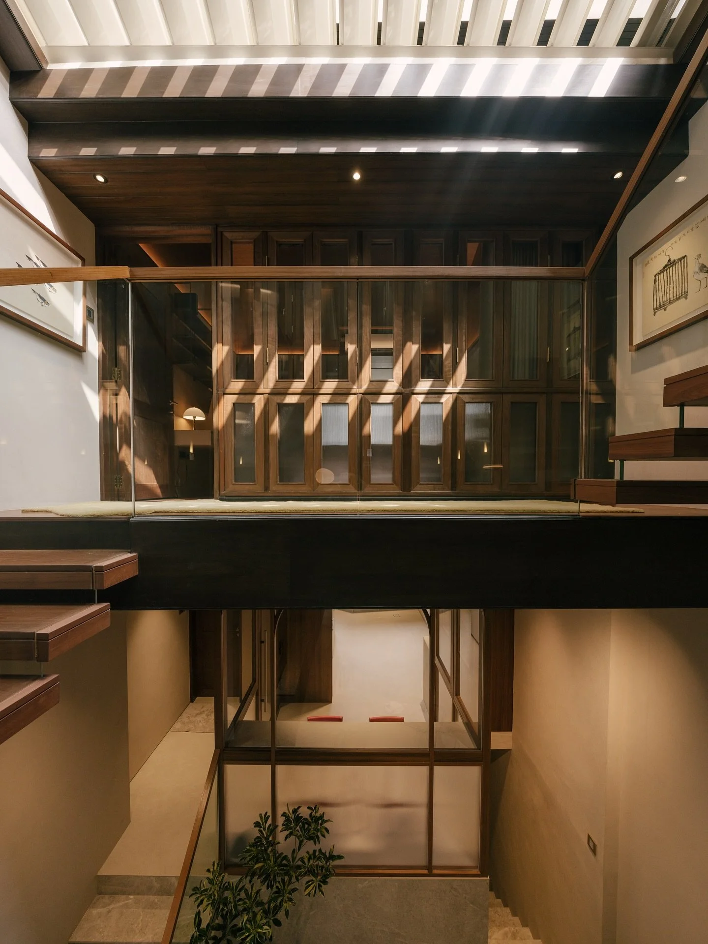 We have chosen to work with largely natural materials to complement the existing timber palette of the shop house – namely timber and stone varieties of various finishes for the hard furnishing: and leather and natural fabric for soft furnishin