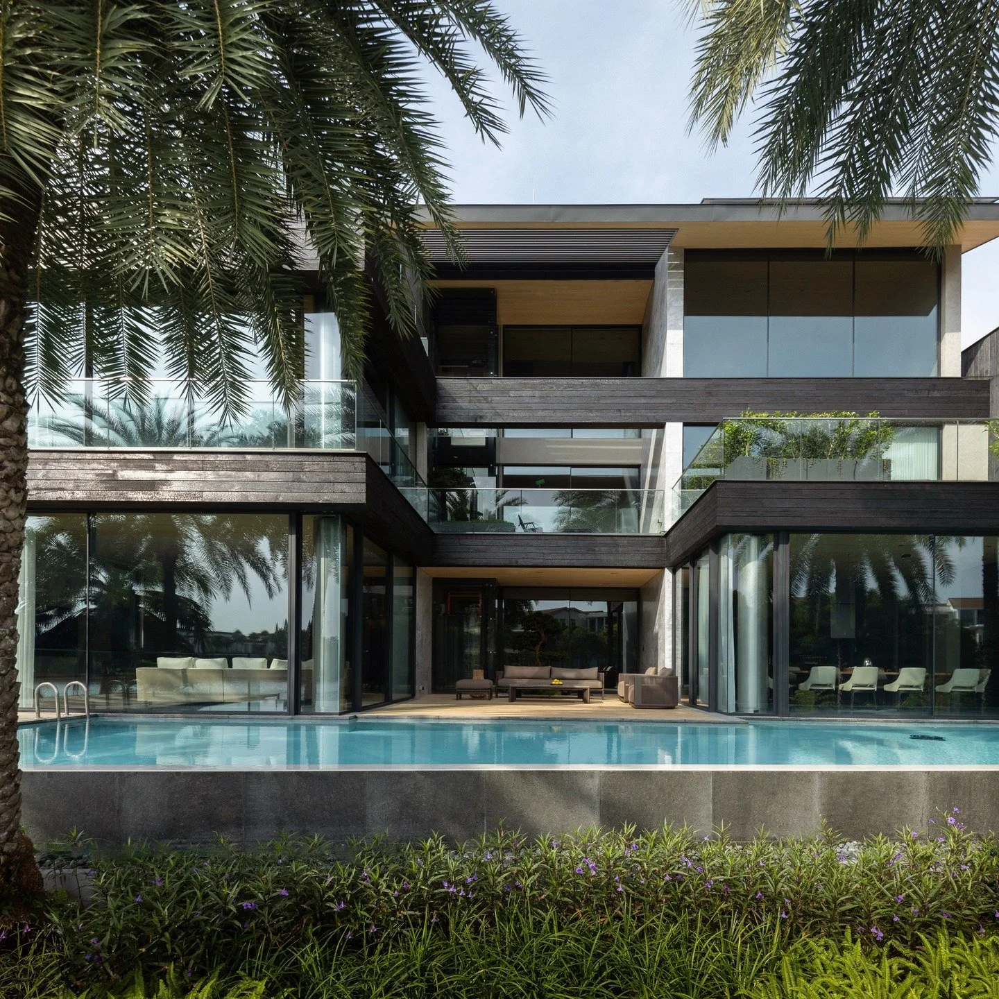 Shou Sugi House &mdash; Sentosa Cove

At Shou Sugi House, a Sentosa Cove waterfront residence, we transformed an ageing property by stripping it back to its bones and rebuilding its identity around a single idea: charred timber.

Inspired by the Japa