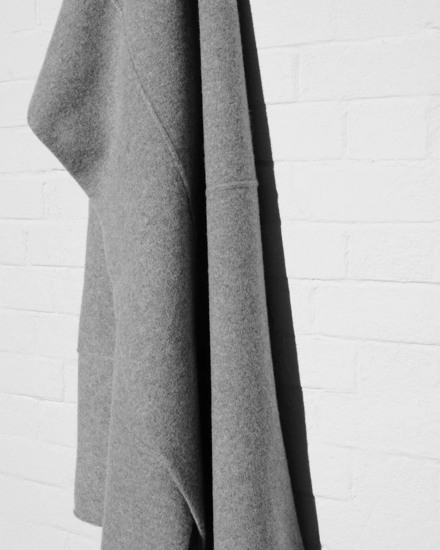 O N - T O N E  blanket scarf.
Hand framed and linked in-house from the softest, Superfine Lambswool. Seen here in Flannel Grey.
RWS certified yarn. Dyed and spun on the banks of Loch Leven, Scotland.
New Season collection of scarves, wraps and stocks