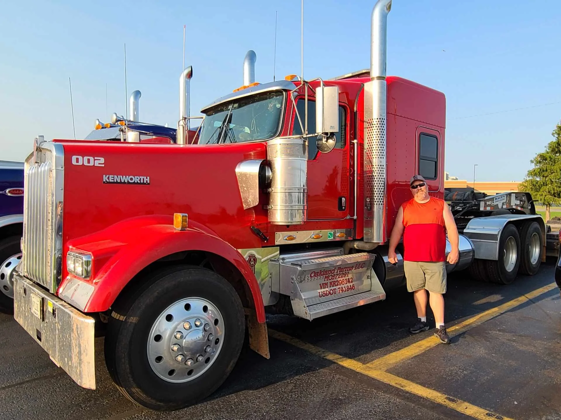 Kevin M, next to Truck 002. We think they both look great!