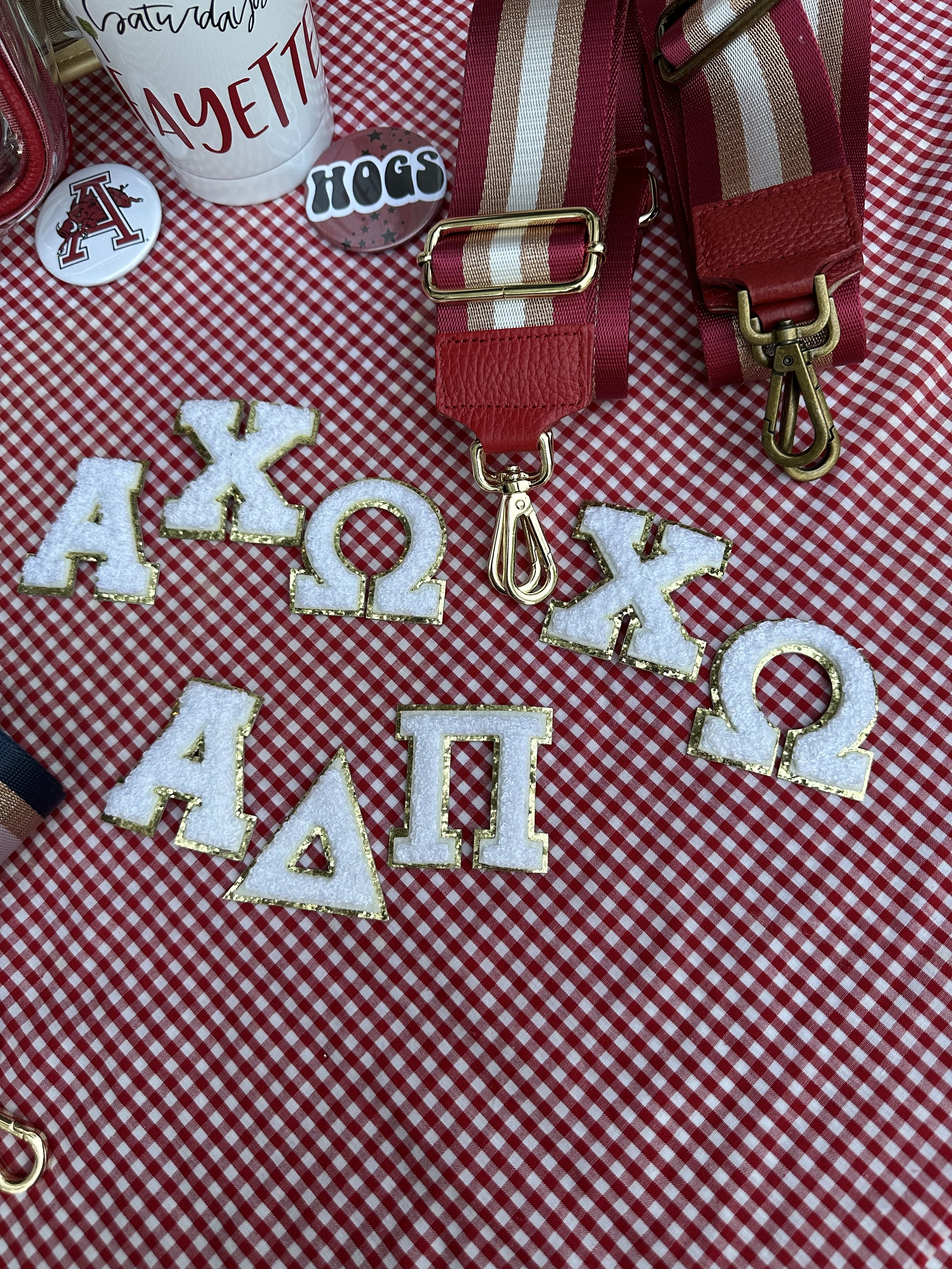 Cute white chenille letters edged in gold glitter. Pictured are AChiO, XO, and ADPi.