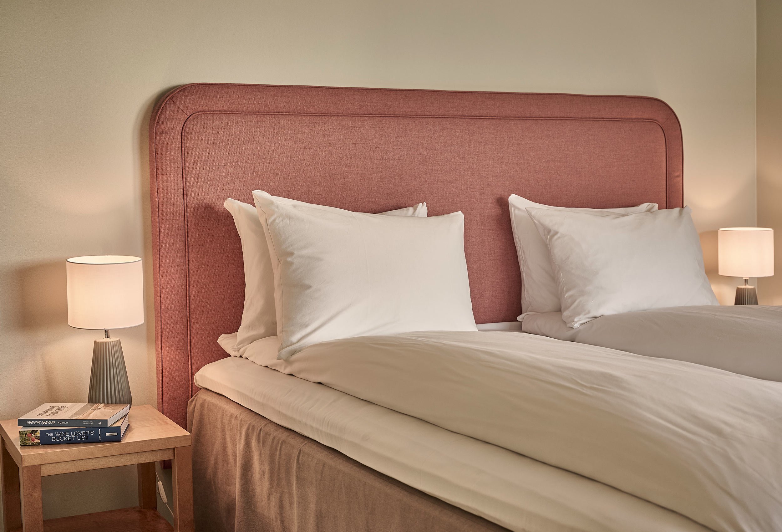 Close-up of luxurious headboard and bed from hotel room at sola beach hotel and spa