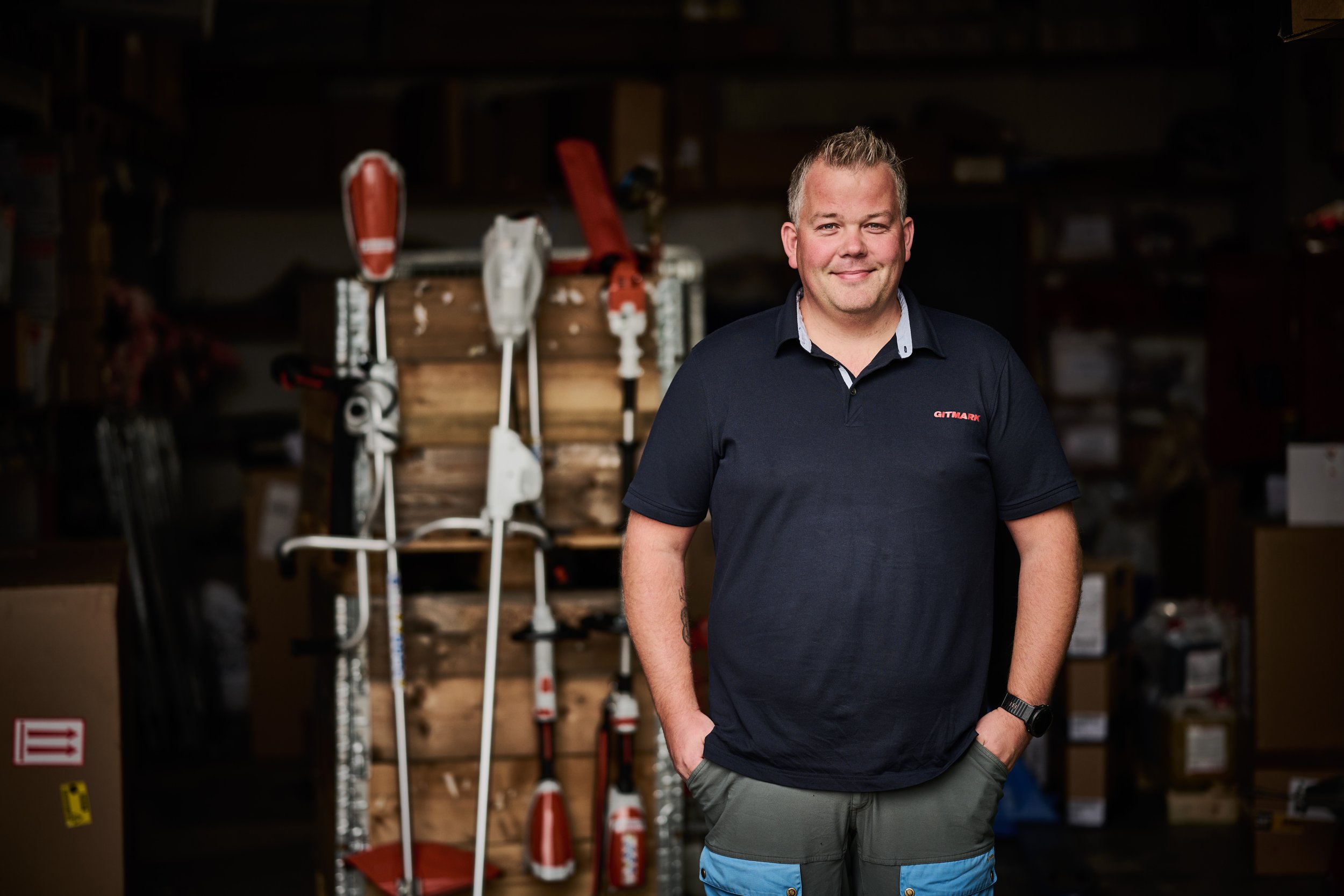 Portrait of employees in work situation with products at machine supplier Gitmark in Norway.