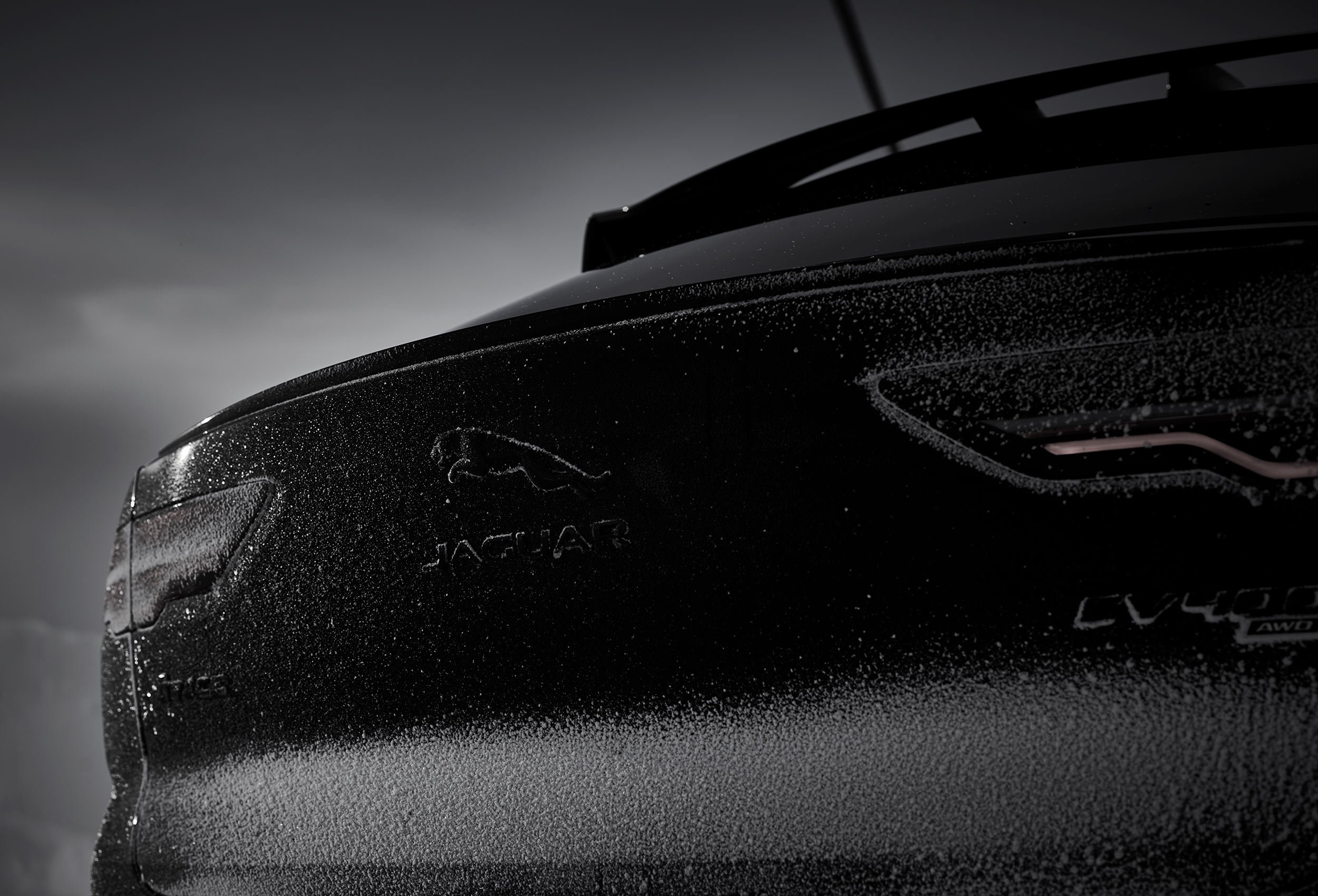 Jaguar I-PACE Land Rover in snow landscape. Car photography and drone video in Norway