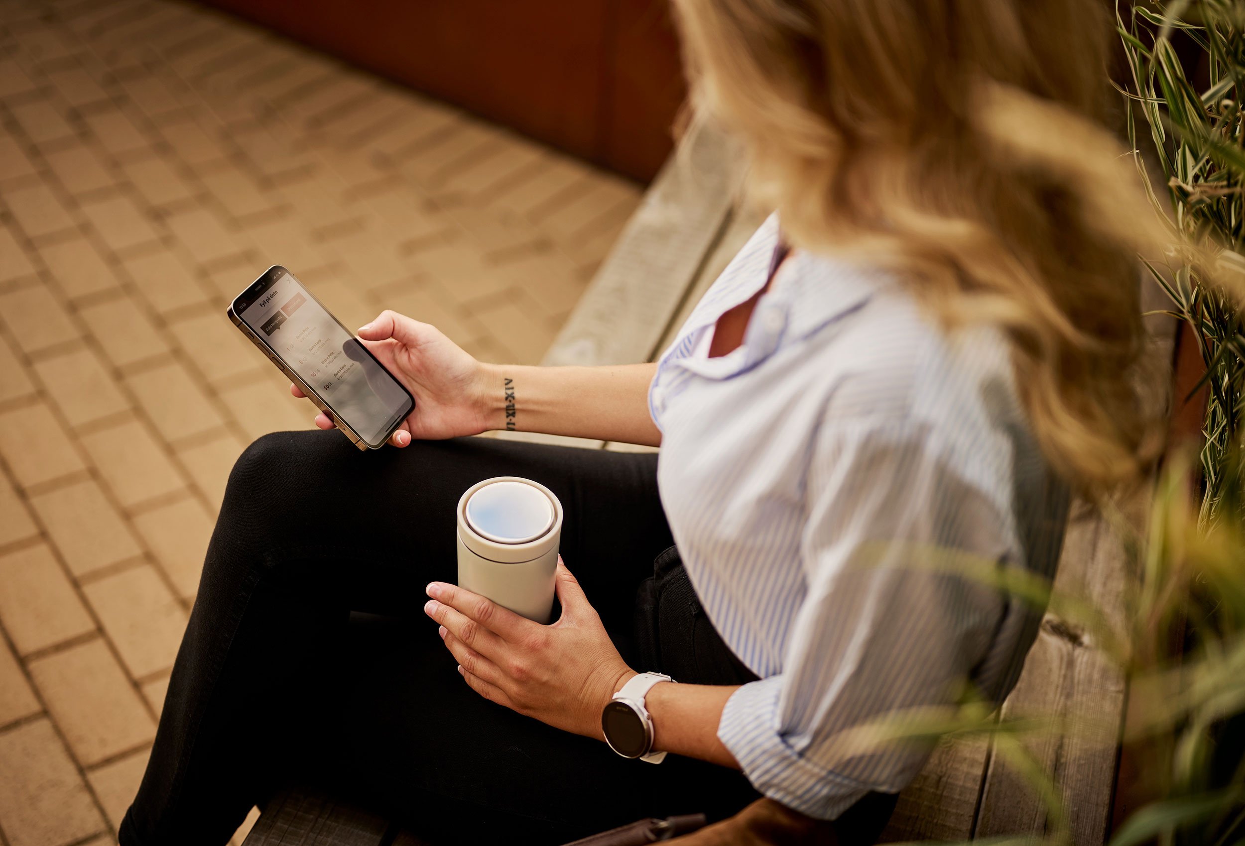 Phonero mobile operator branding video. Woman on bench with phone in commercial portrait photo in Kristiansand Norway.