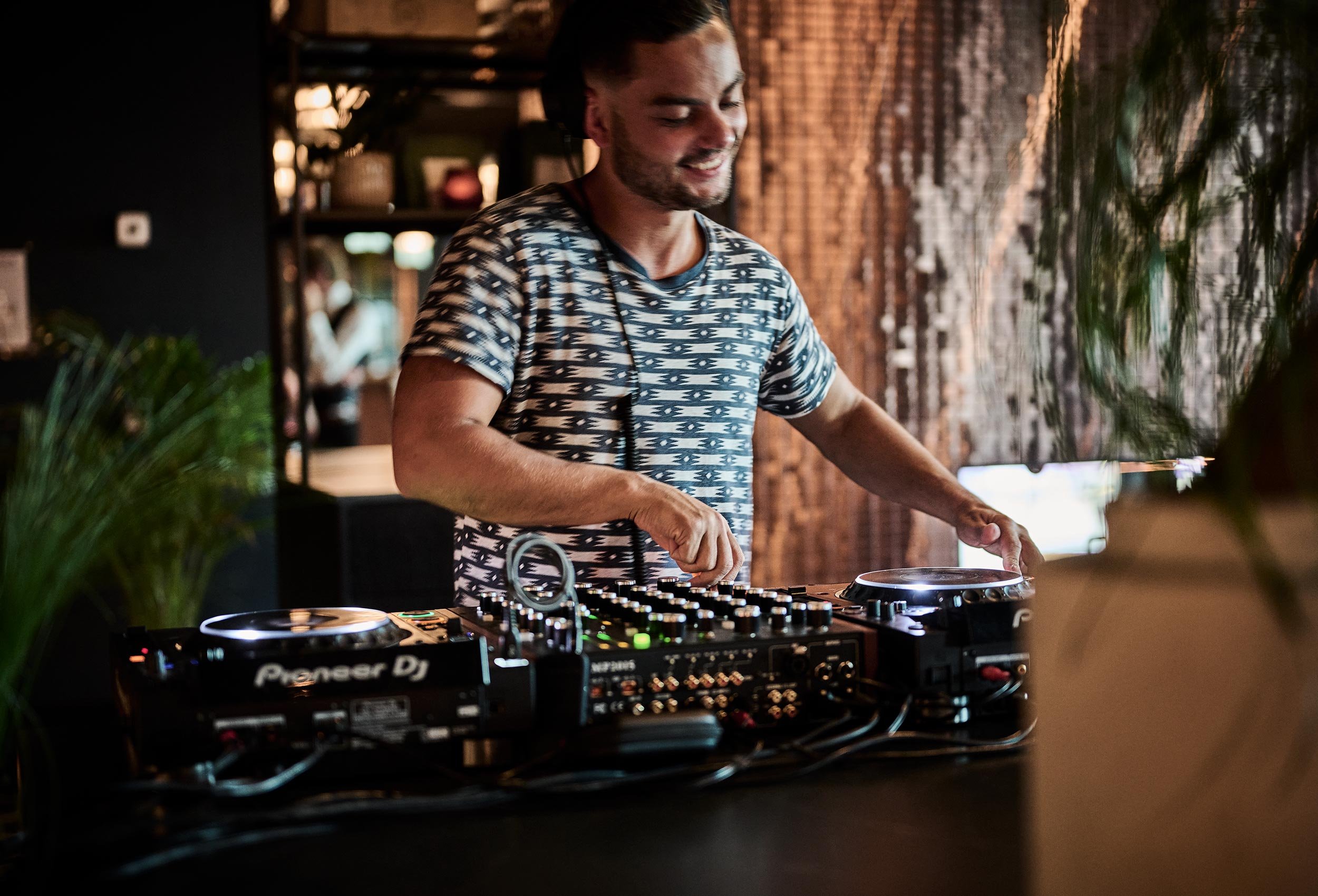 Close-up of DJ playing music at restaurant at Radisson Blu Caledonien Hotel, Kristiansand