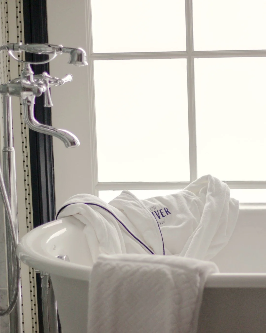 Deep soak. Soft light. Zero interruptions. 
 
Most rooms at The Oliver come with a full bath, perfect for relaxing after a long day and slipping straight into a robe that&rsquo;s somehow even softer than it looks. 
 
Yes, you can take it home. They&r