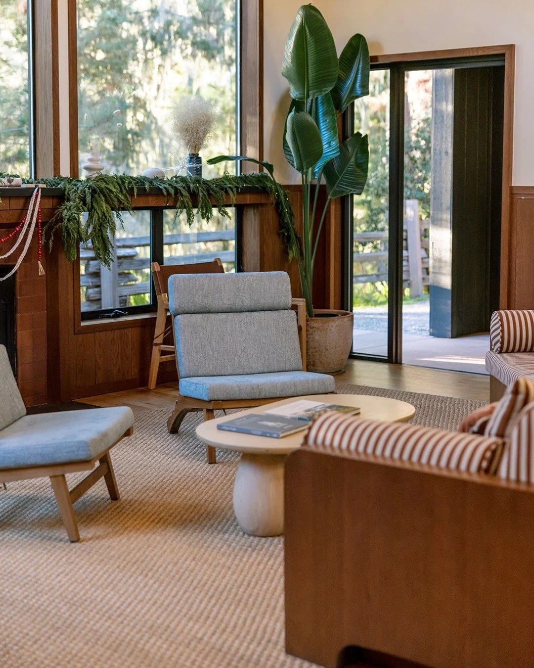 Soft light filters through tall windows, catching on polished wood and quiet corners. 
A welcome in every sense, the Lodge lobby offers space to sit, sip, plan, or simply watch the trees. 
 
📸: @megangoetzcreative