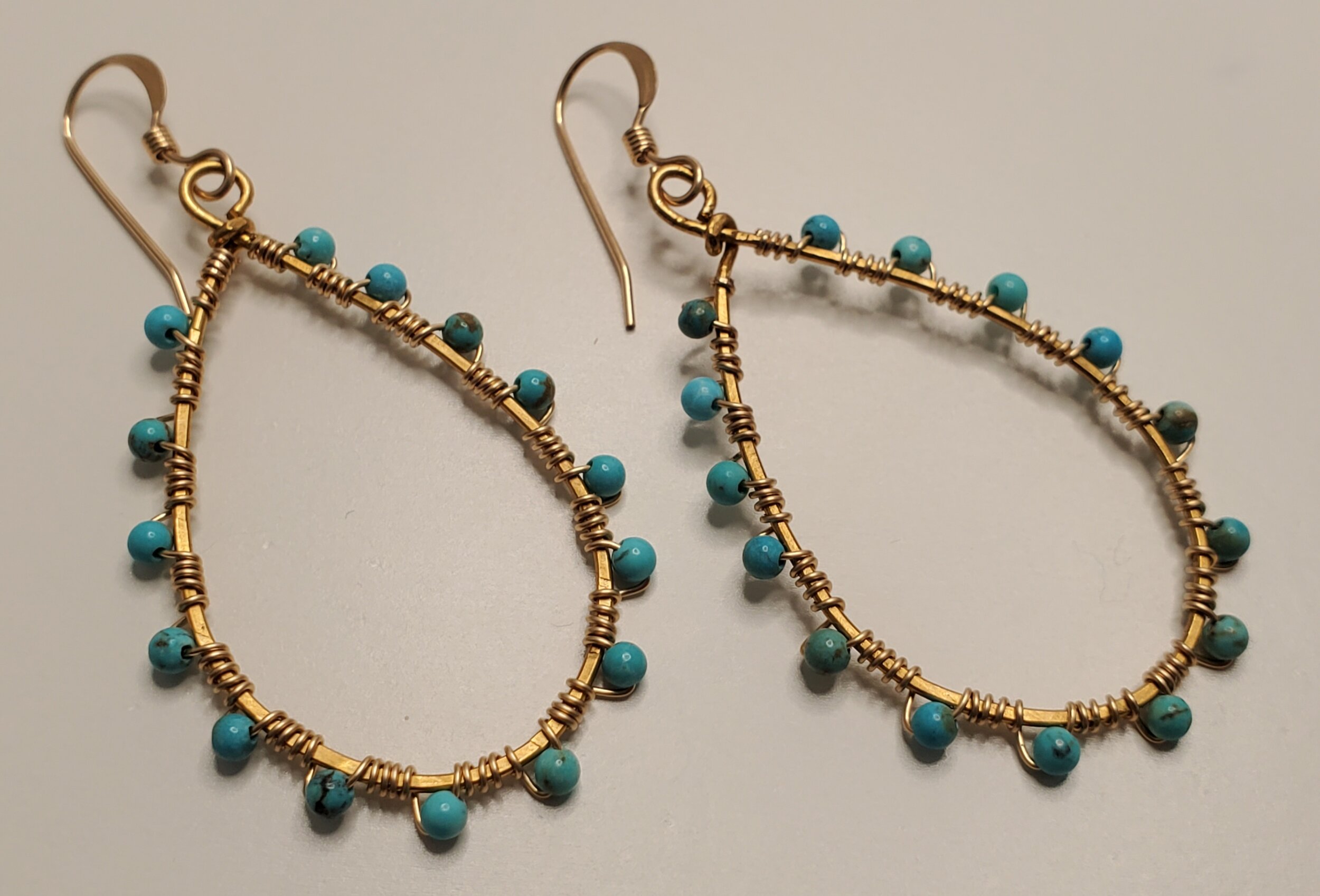 Turquoise Surrounded Earrings Gold Image 1.jpg