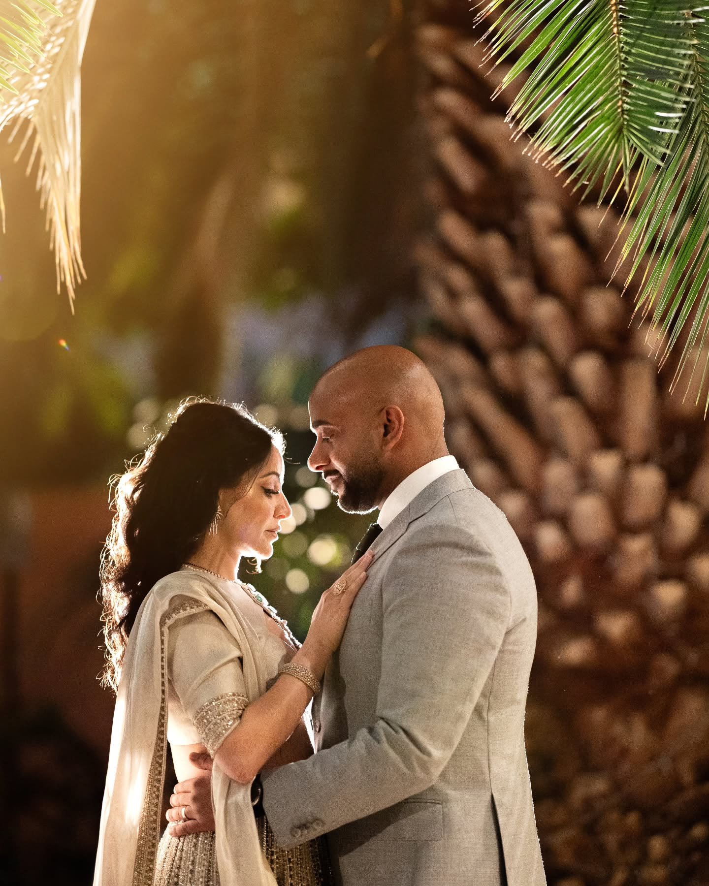 They&rsquo;re falling in love under palm trees, and I&rsquo;m just over here adjusting my ISO and rethinking my single status. 🌴📸

#ThirdWheelWithAView #BookedButNotBusyInLove
#IndianWedding #DesiWedding #BigFatIndianWedding #ShaadiVibes #WeddingSe