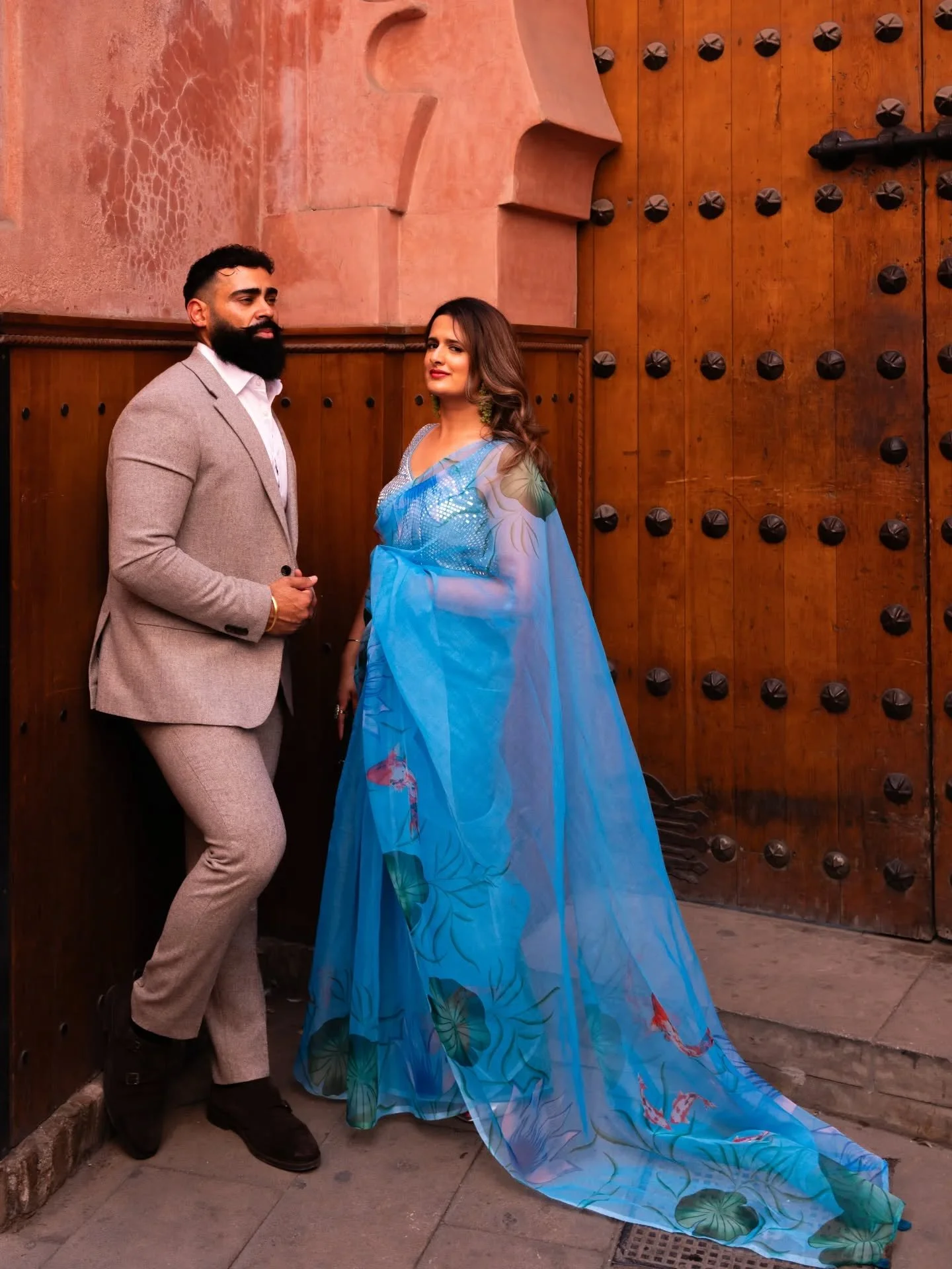 Known for being the "Red City". In the maze of Marrakech's narrow streets, we stumbled upon a set of historic doors that felt made for them!

#bridalcouture #coupleshootideas #preshoot #sikhwedding #destinationshoot