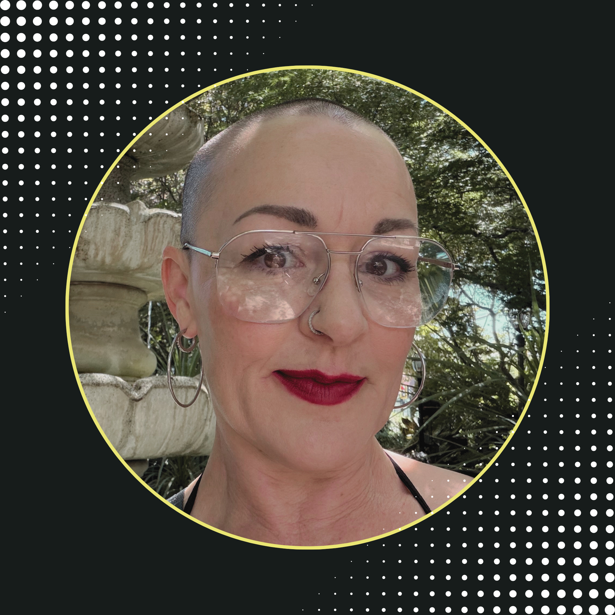 Close-up of a woman's face with shaved hair, wearing stylish glasses and red lipstick, outdoors with trees in the background, and a decorative black and yellow graphic border.