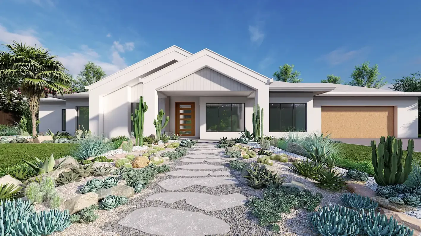 Modern white house with desert landscape garden featuring cacti and succulents, stone pathway, and a blue sky.