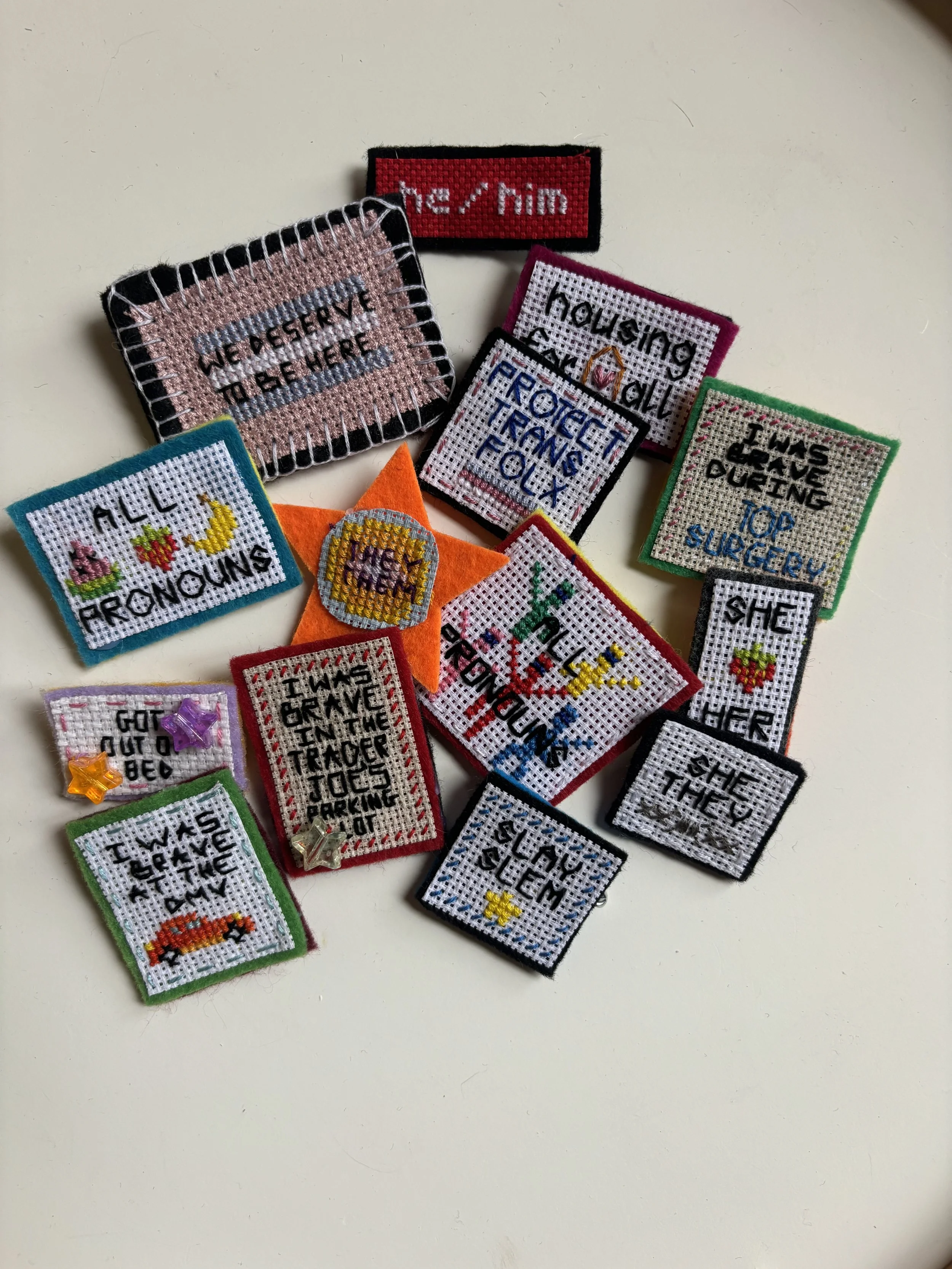fm at designs pins.jpeg