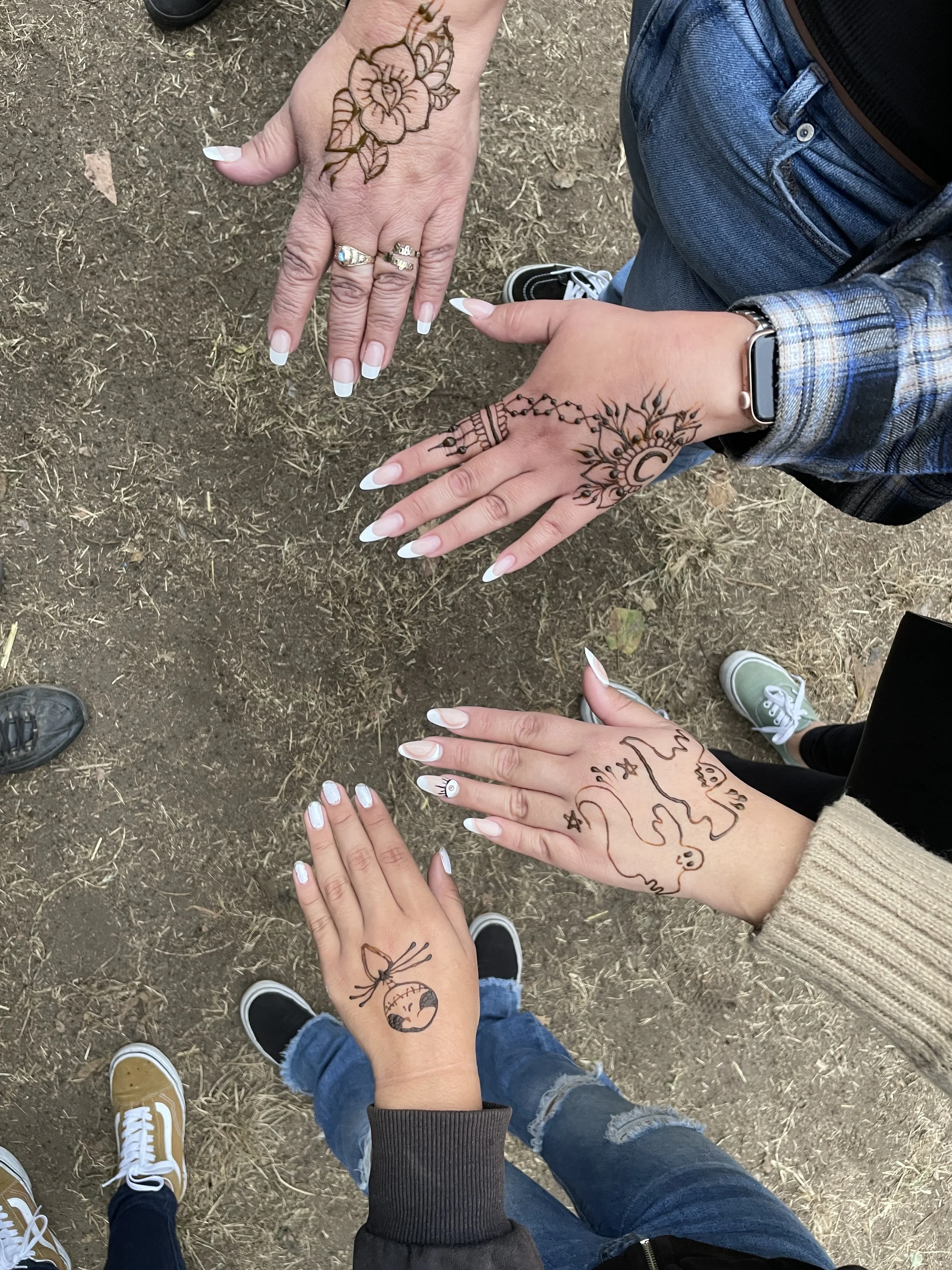 fm wendy four henna hands.jpeg