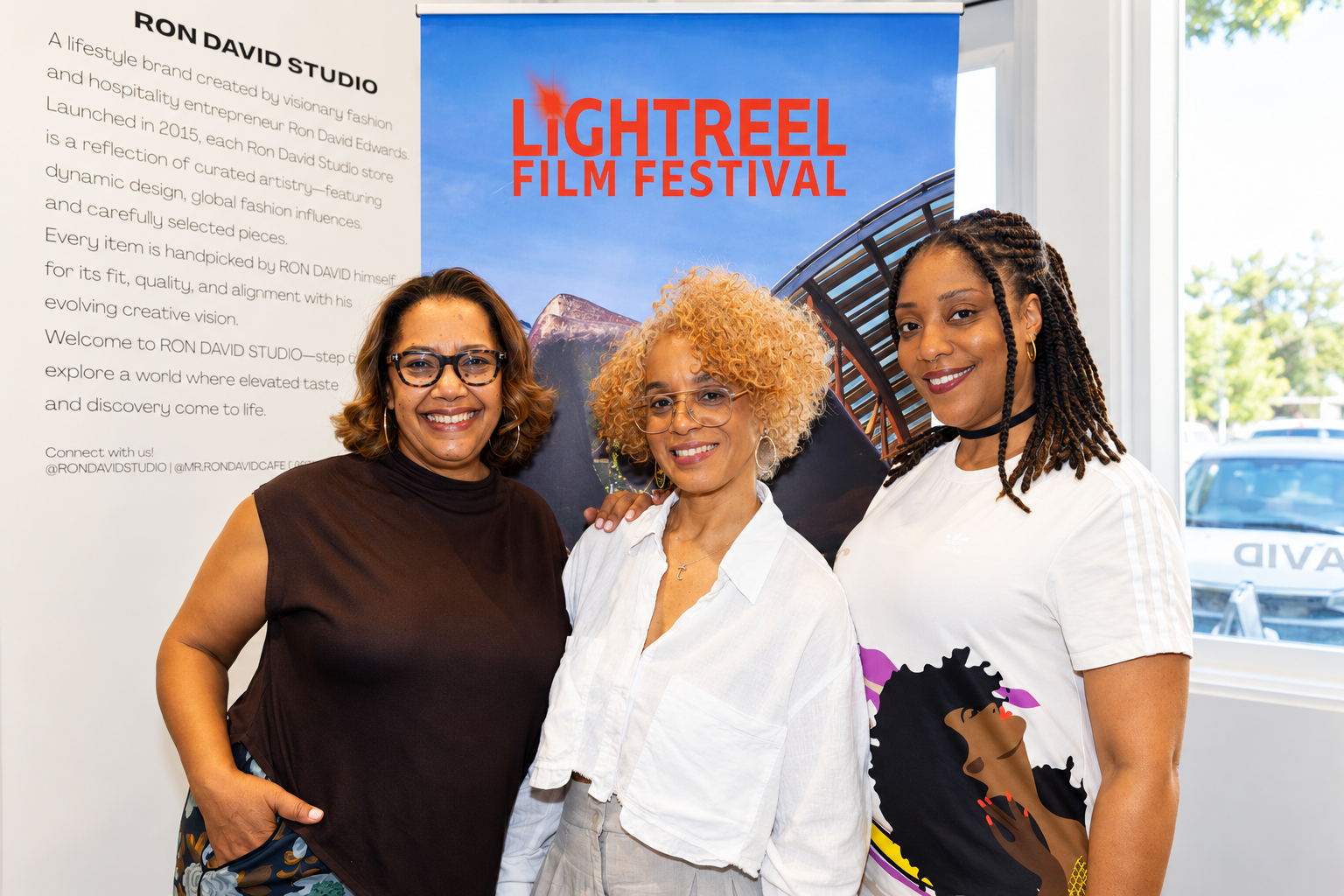 Smiling Trio at LightReel Festival.png