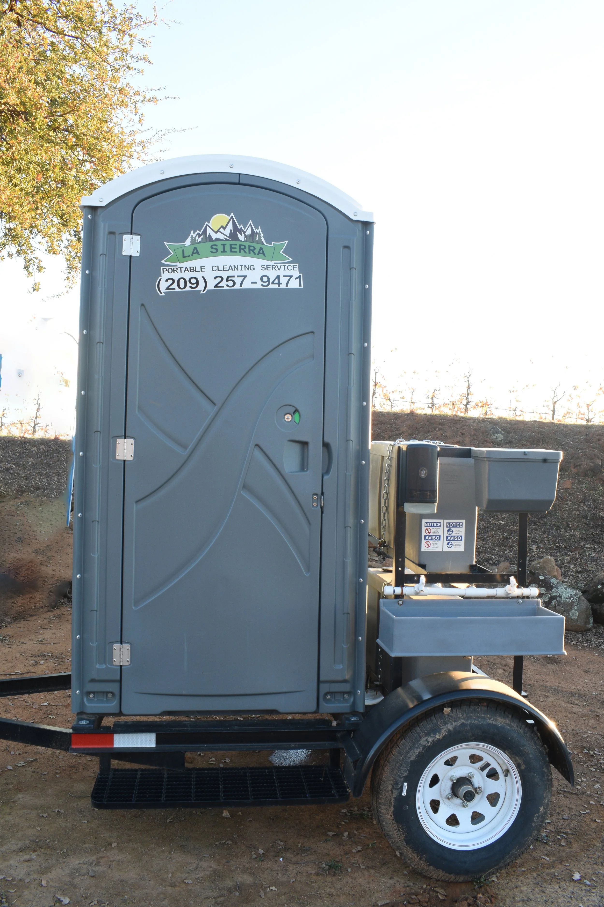 PORTA POTTY ON A TRAILER.jpg