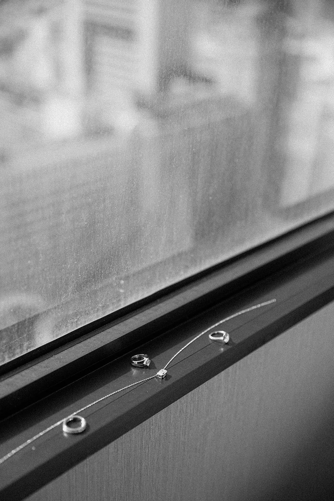 wedding jewelry in a black and white detail photo