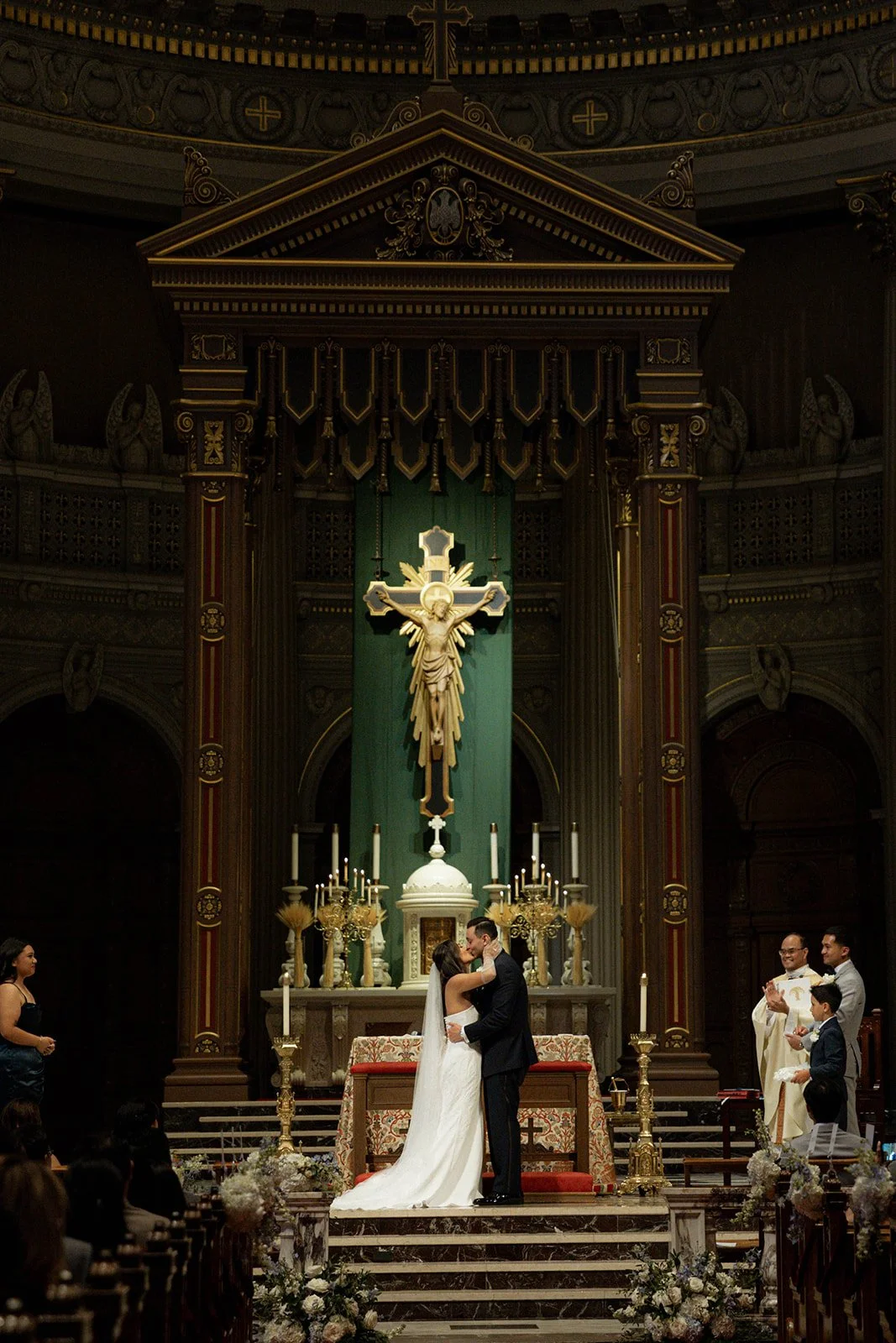 A first kiss during a church wedding ceremony