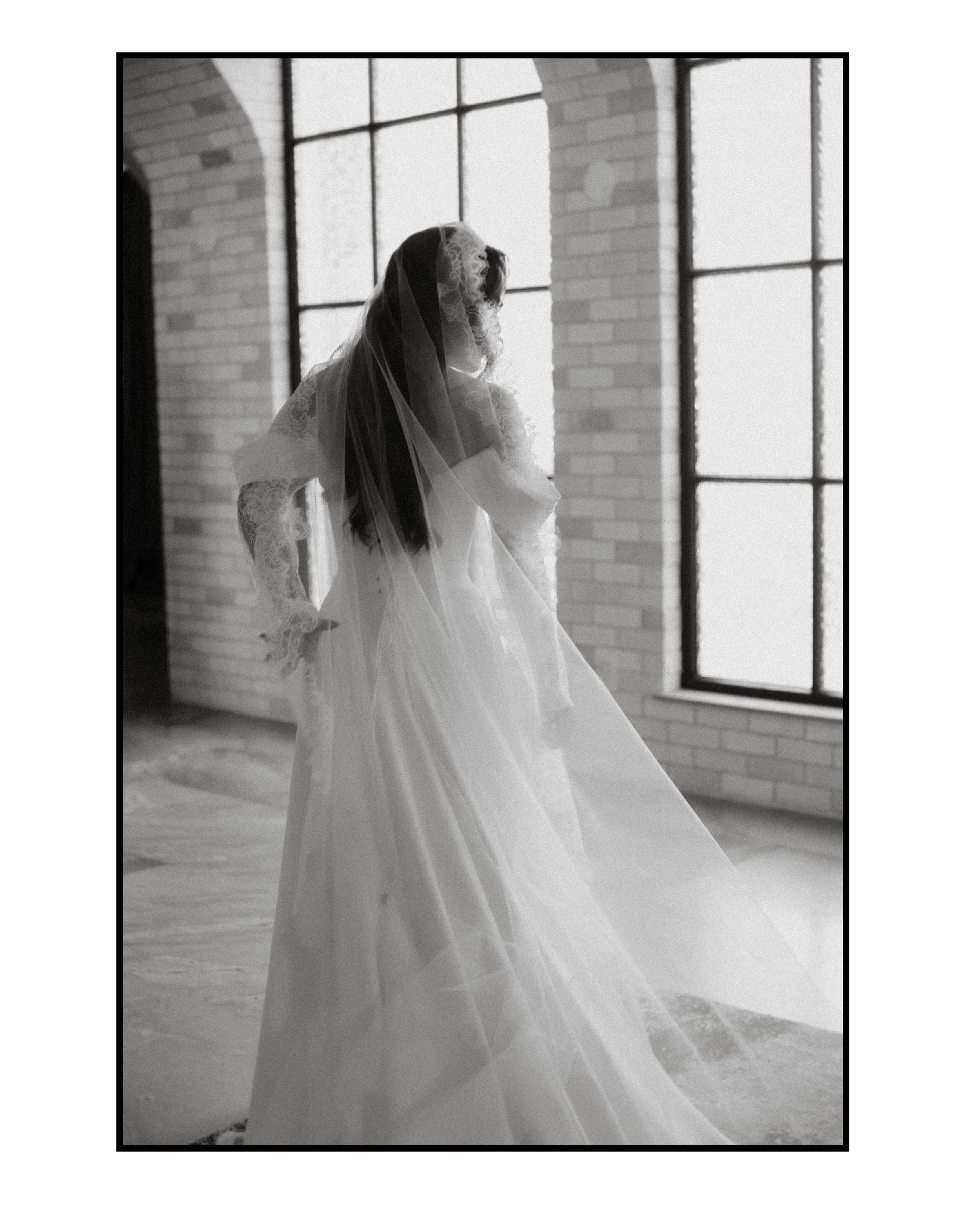 Sacramento Wedding Photographer Grand Island Mansion Wedding Photographer NorCal Wedding Photographer bride and groom reaching for each others hand