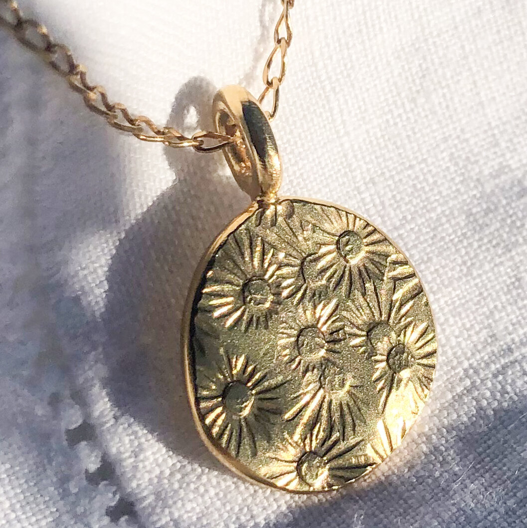 Gold plated flower pendant.jpg