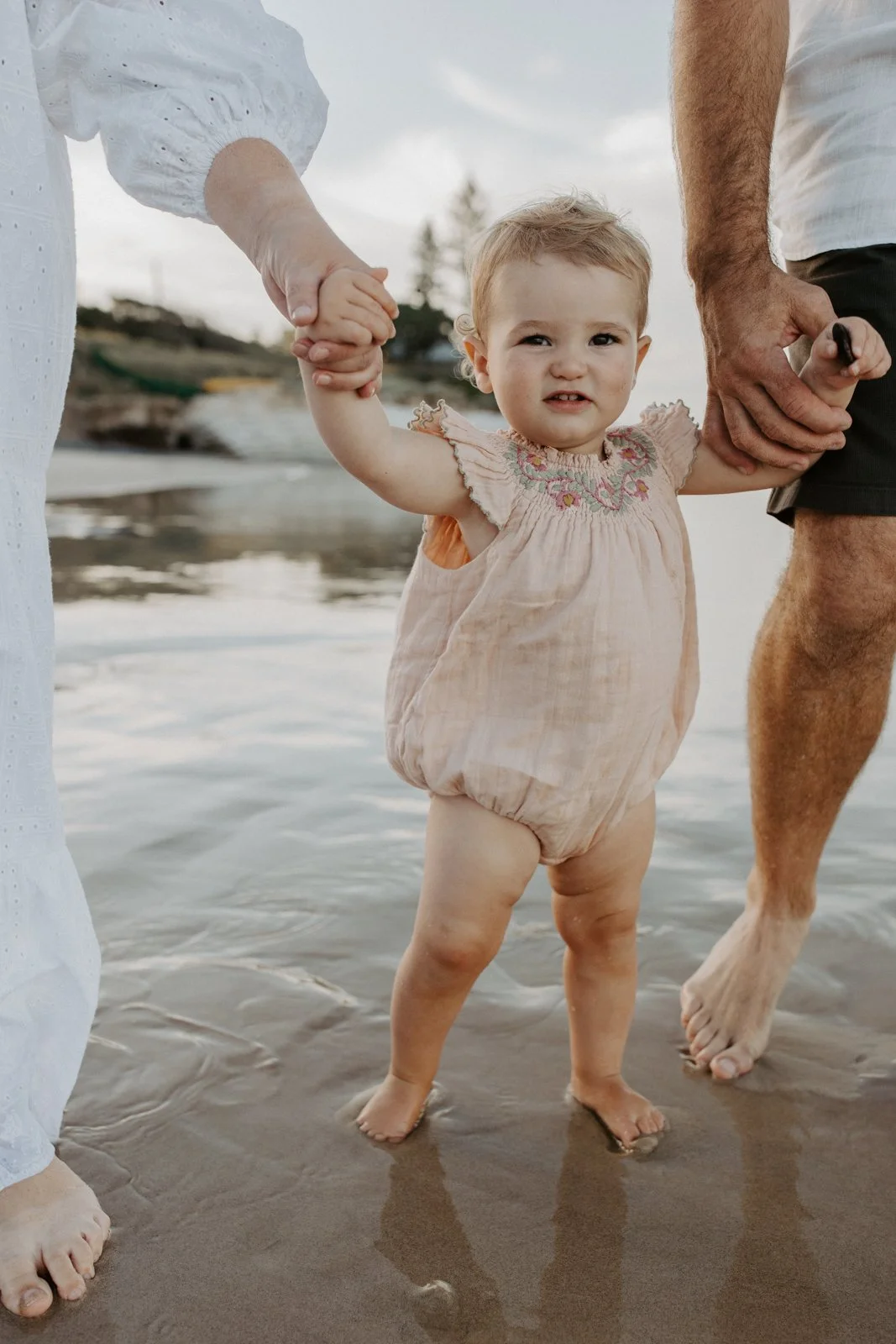 child at the beach in Byron Bay
