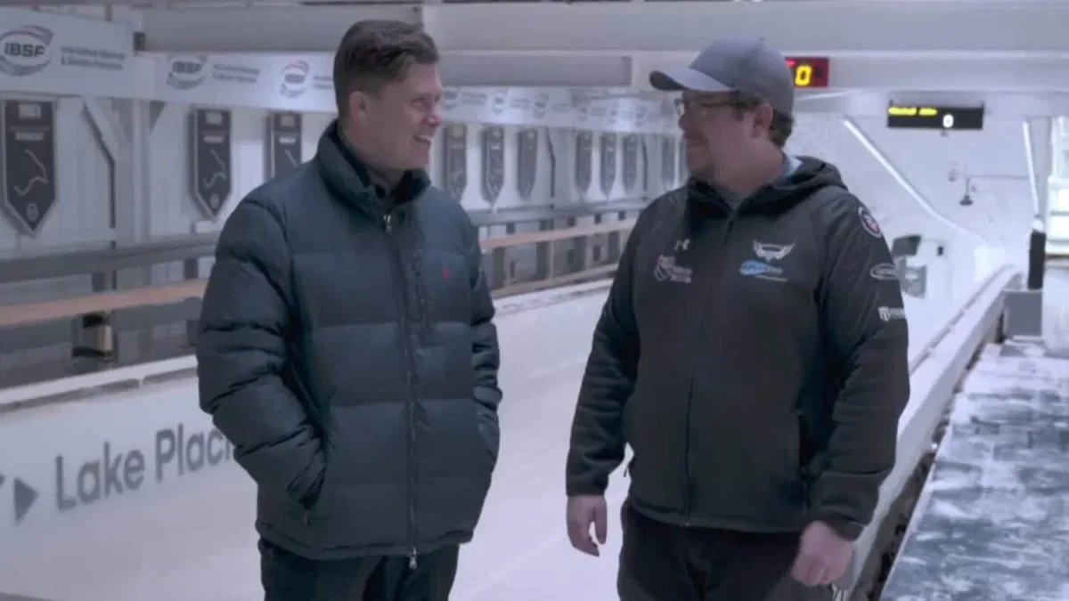 SNL Weekend Update anchor colin jost at lake placid bobsled track.