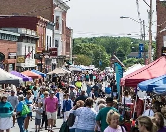 People walking along Montcalm Street in Ticonderoga during the annual StreetFest event.