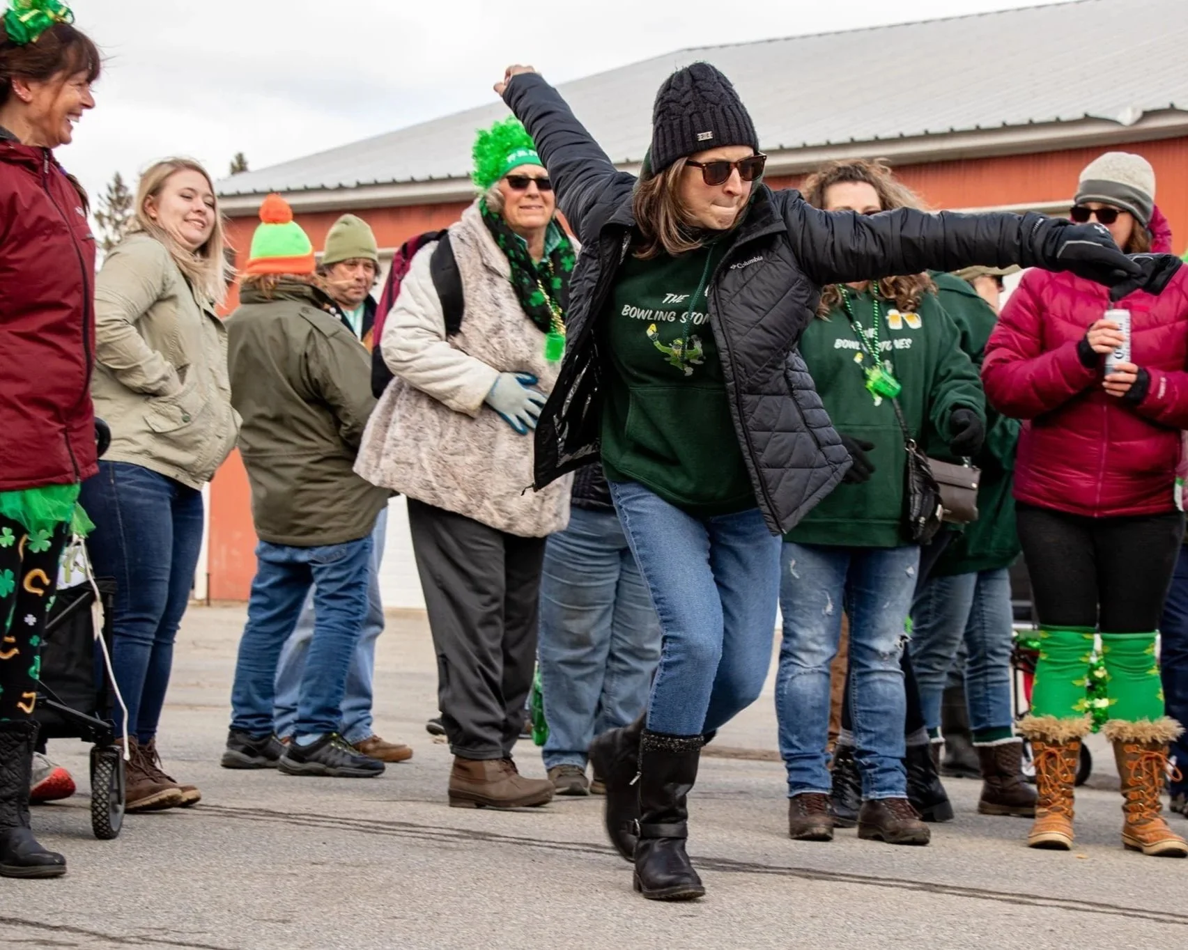 Woman participating in Irish Road Bowling in Indian Lake.