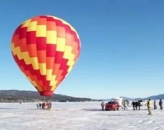 Celebrating winter carnival on frozen Lake George.