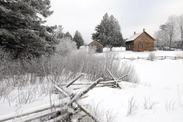 John Brown Farm covered in snow in winter.
