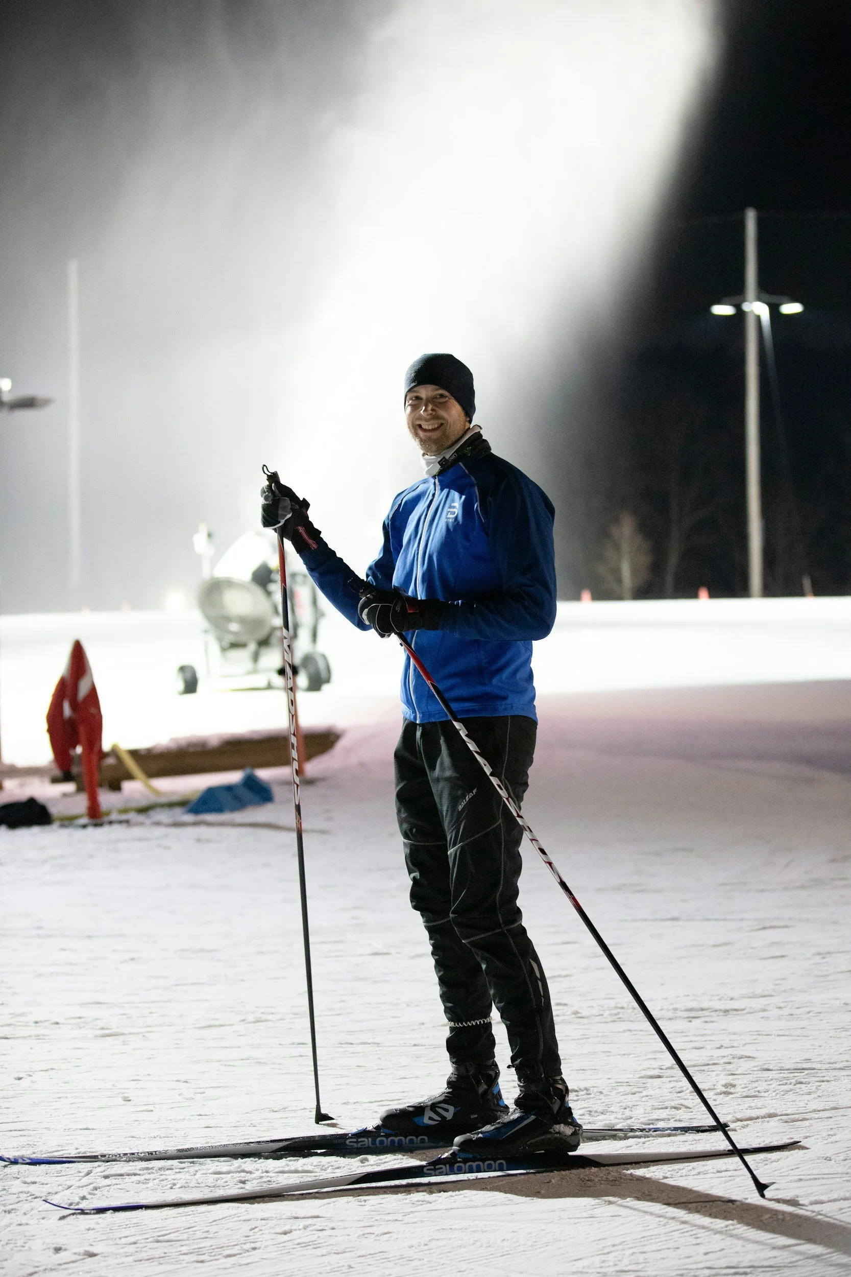 Image of nordic skier illustrating Mt. Van Hoevenberg at night.