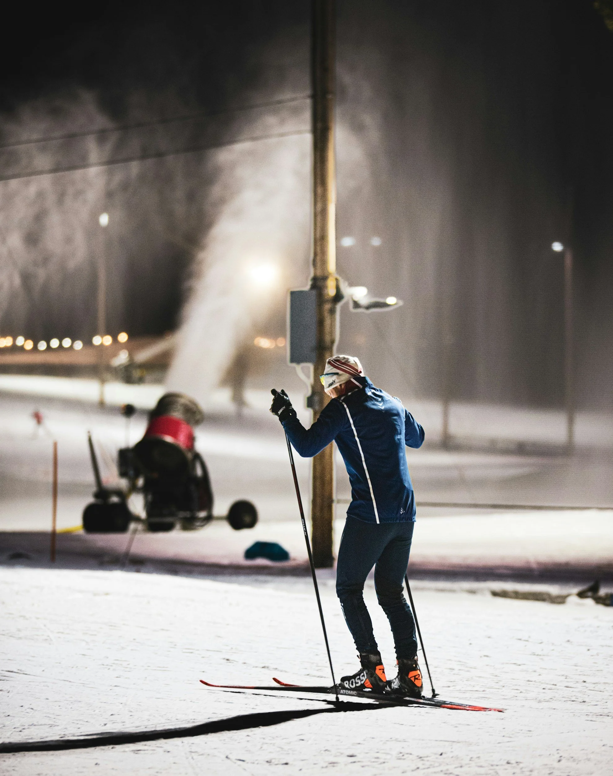 Picture of nordic skier at night similar to full moon party at Mt. Van Hoevenberg.