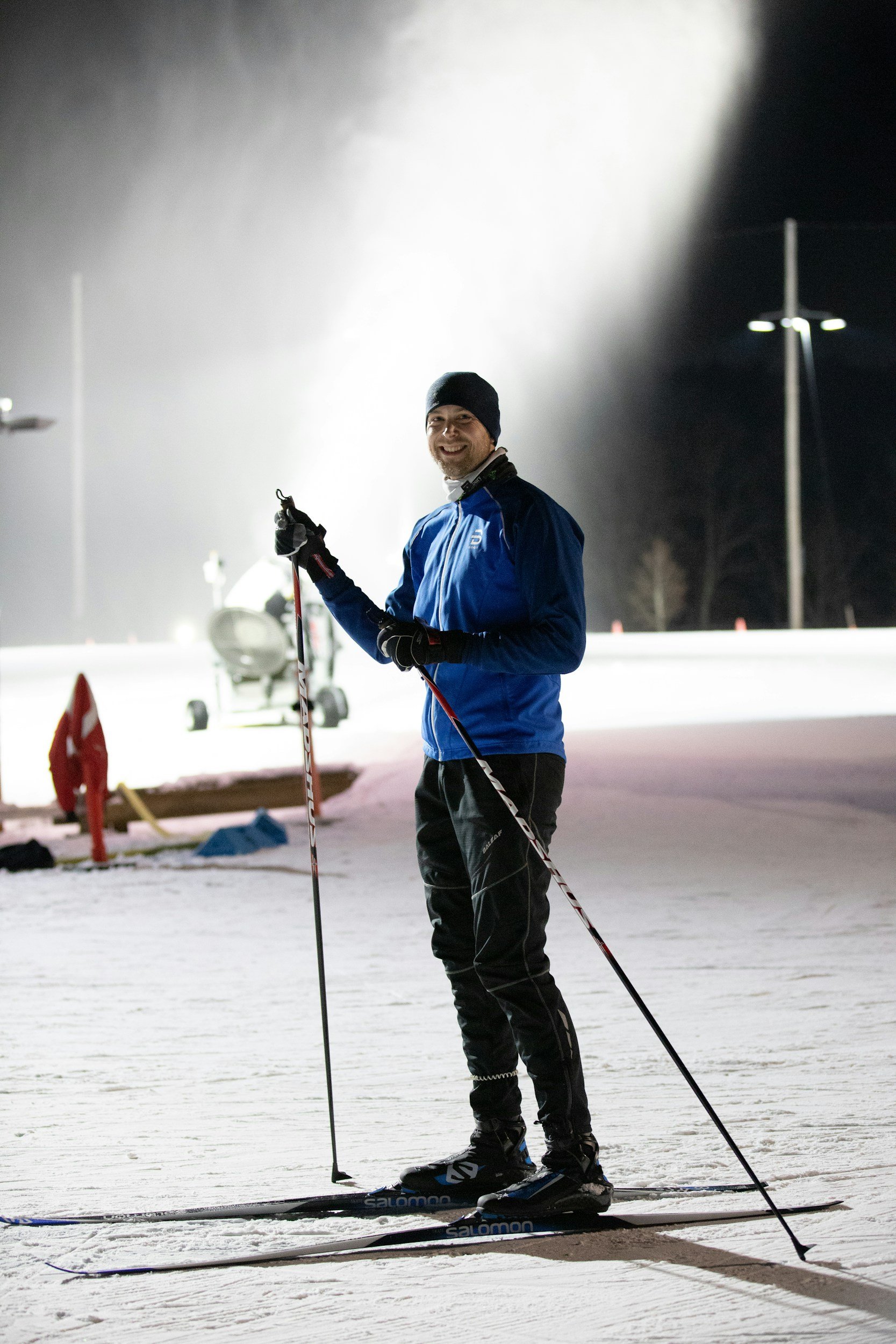 XC skier enjoying a moonlit night.
