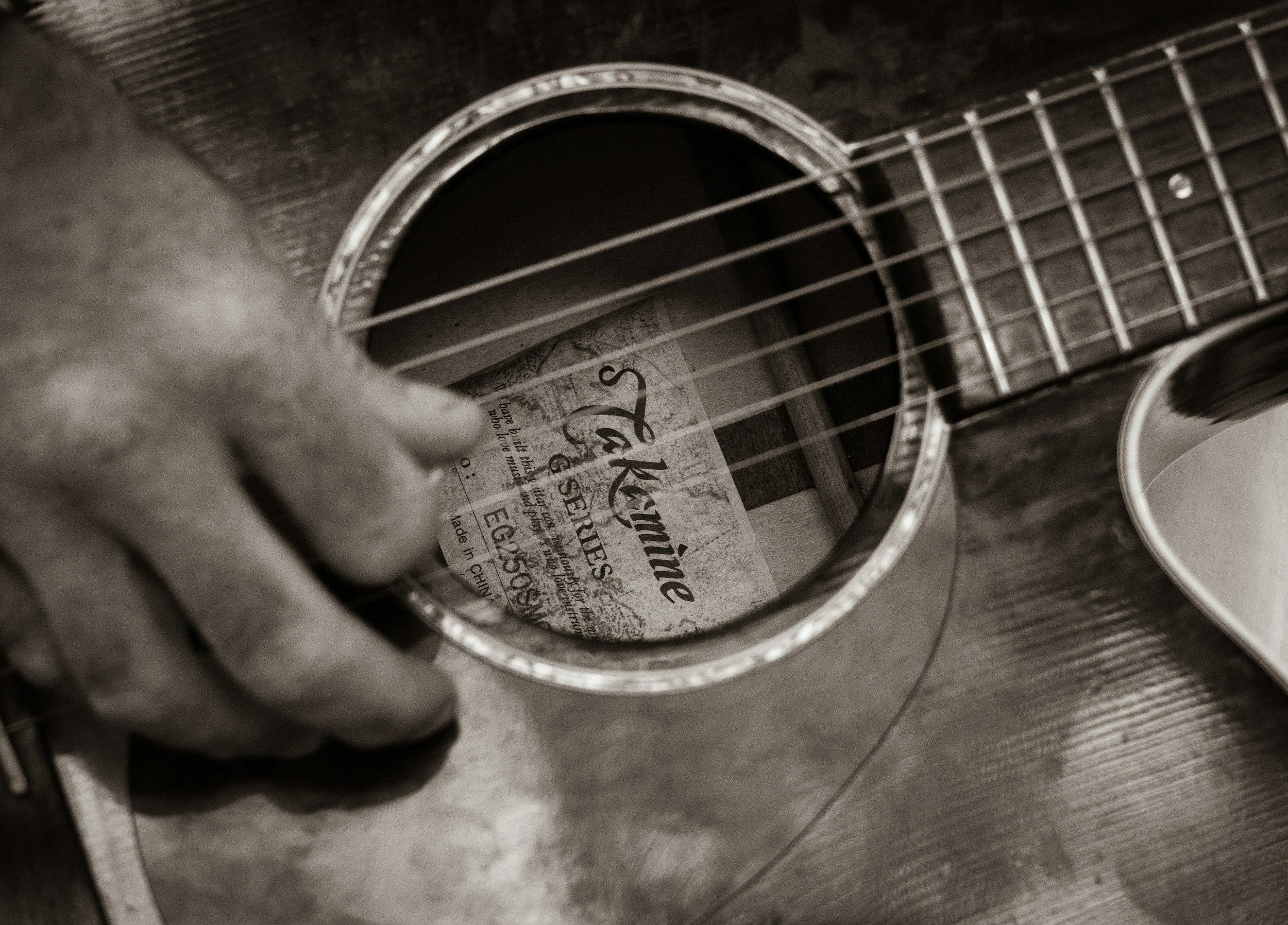 Acoustic guitar used in folk, americana, and bluegrass like the music Bob Stump Band plays.
