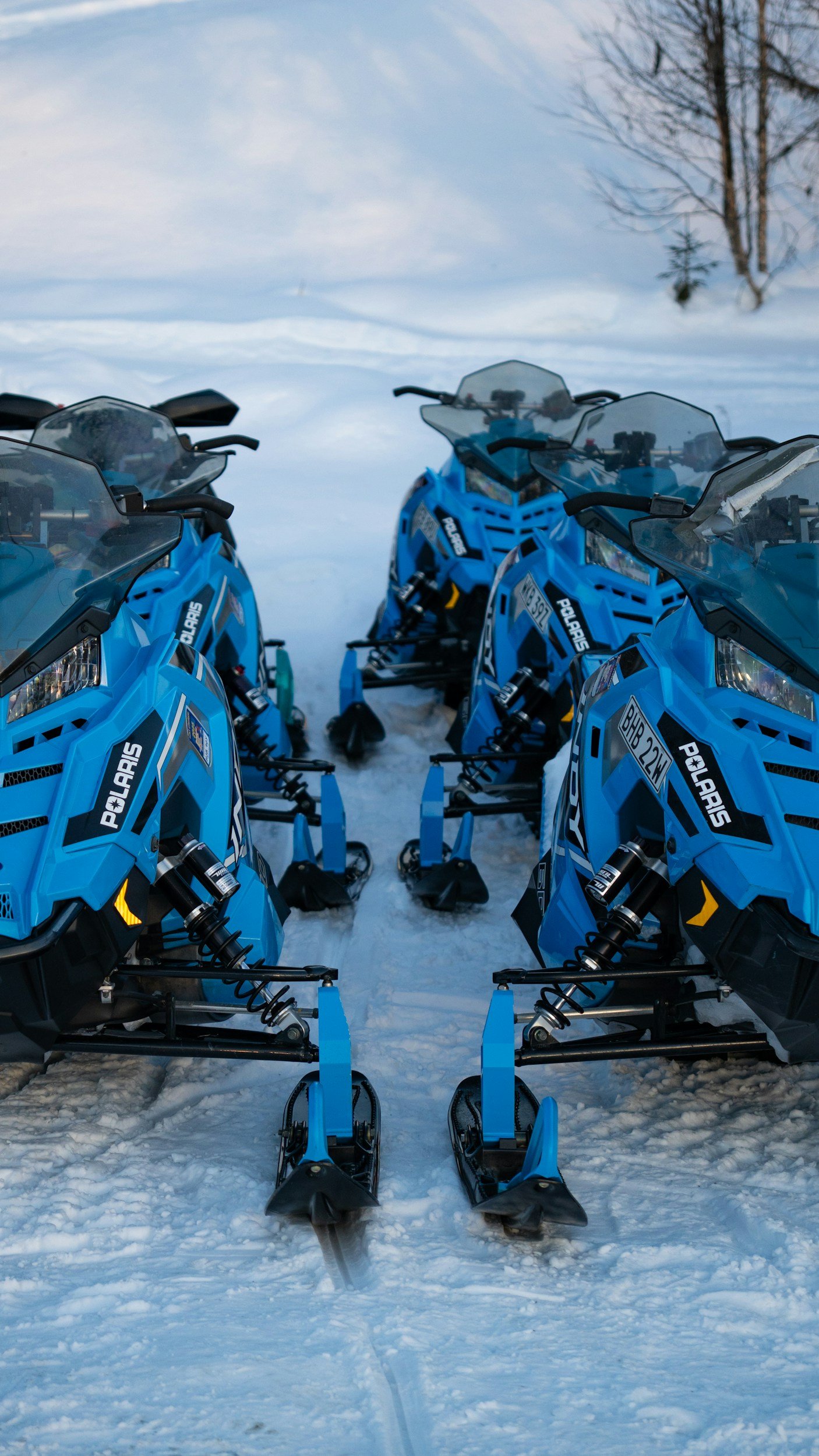 snowmobiles lined up to give rides like those at Ticonderoga's End of Winter Carnival