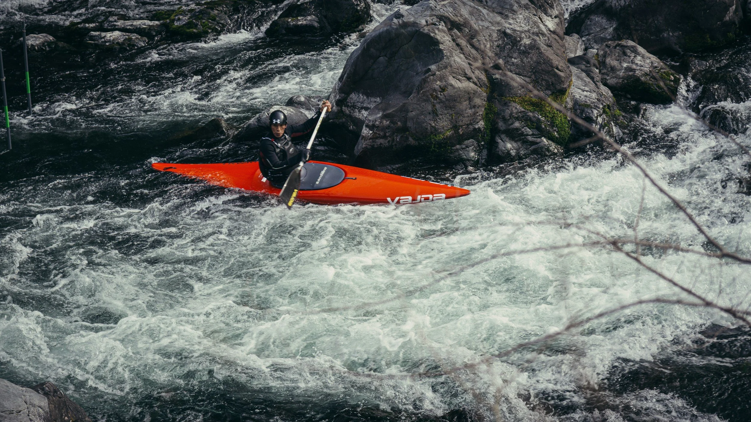 Kayak navigating whitewater rapids in the Adirondakcs.