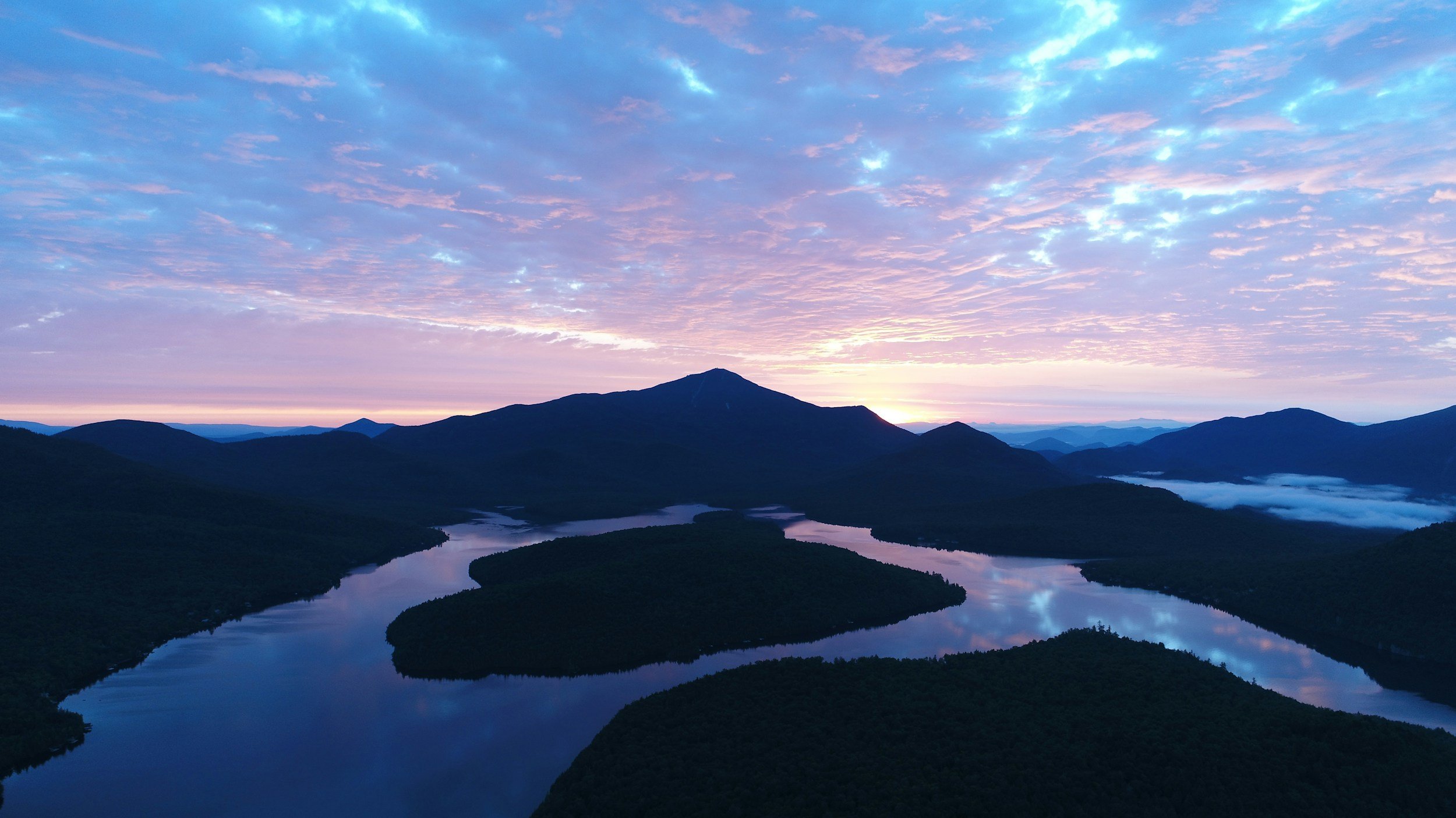 Aerial view of lake placid and the high peaks in the adirondacks.