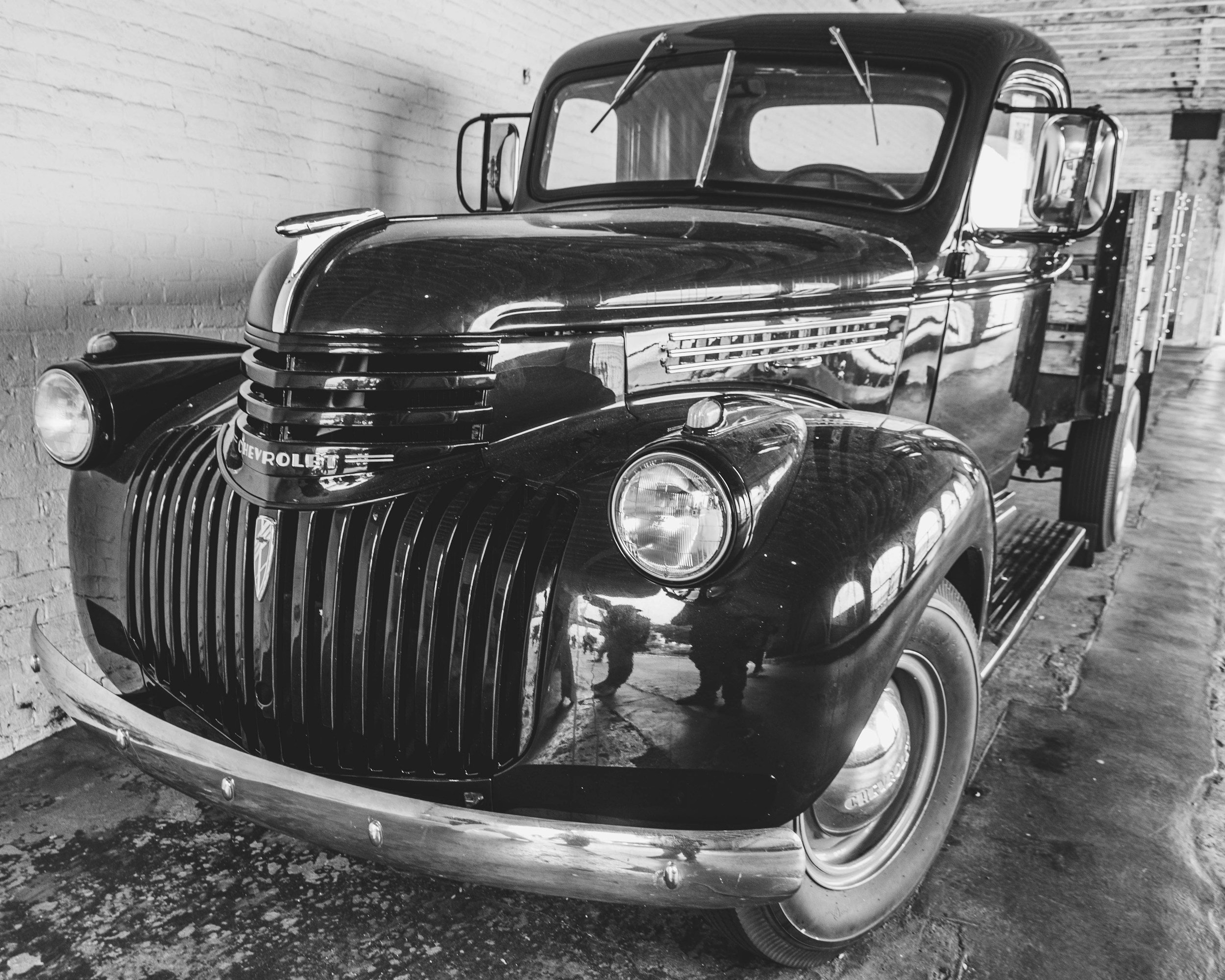 restored chevrolet truck on display at a car show in the Adirondacks.